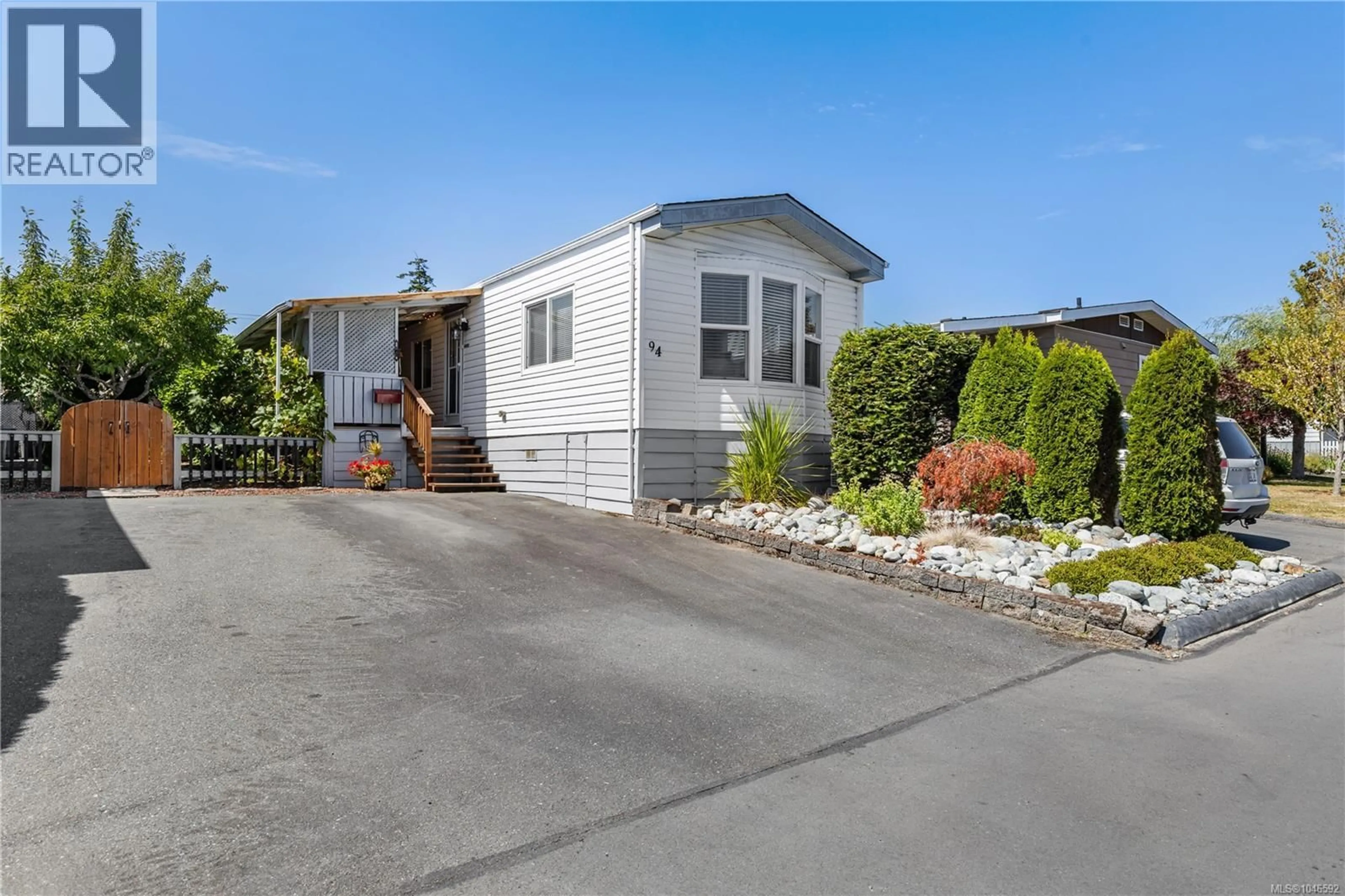 Home with vinyl exterior material, street for 94 - 7701 CENTRAL SAANICH ROAD, Central Saanich British Columbia V8M2B6