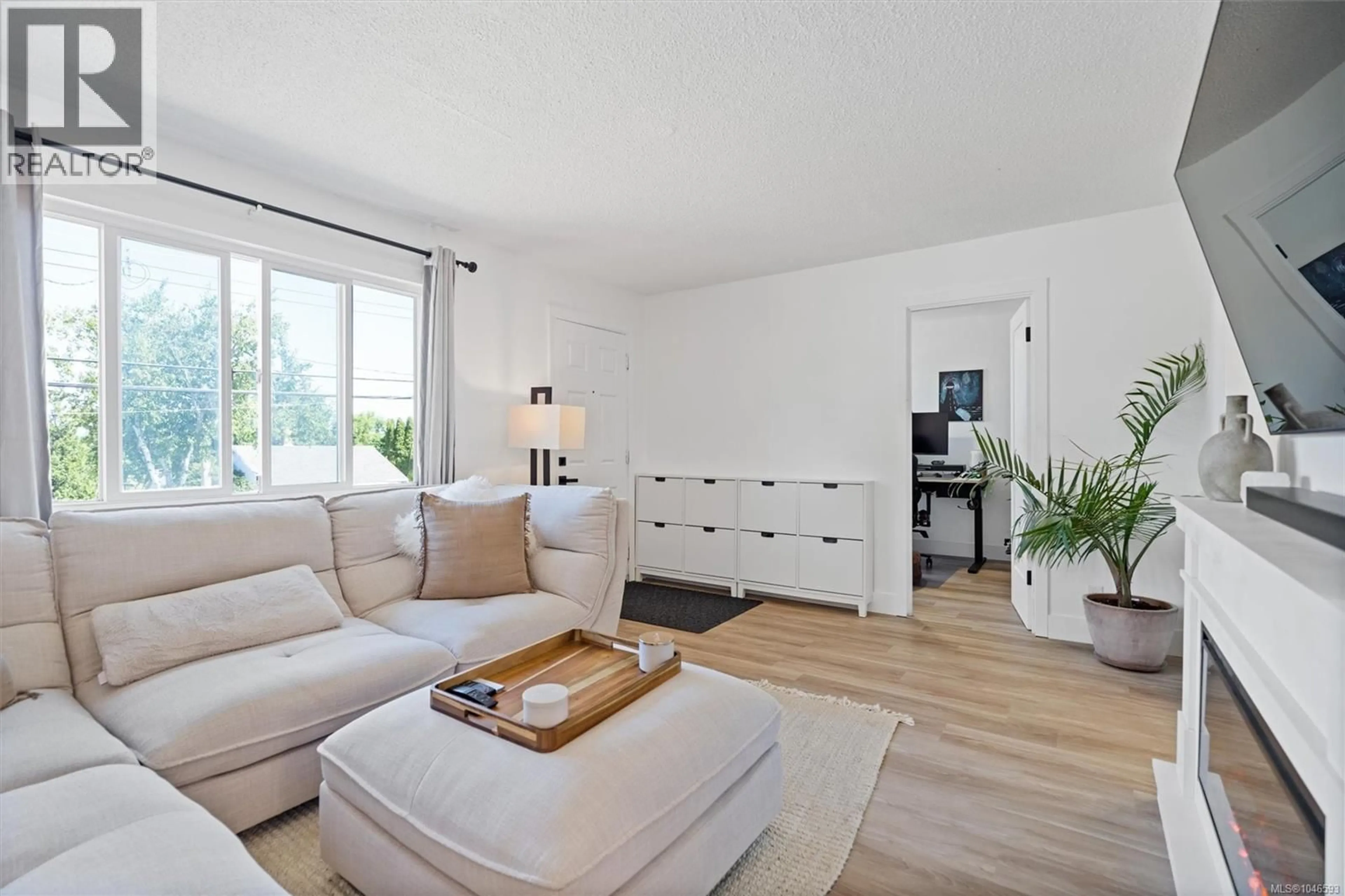 Living room with furniture, wood/laminate floor for 1143 LOCKLEY ROAD, Esquimalt British Columbia V9A4S5