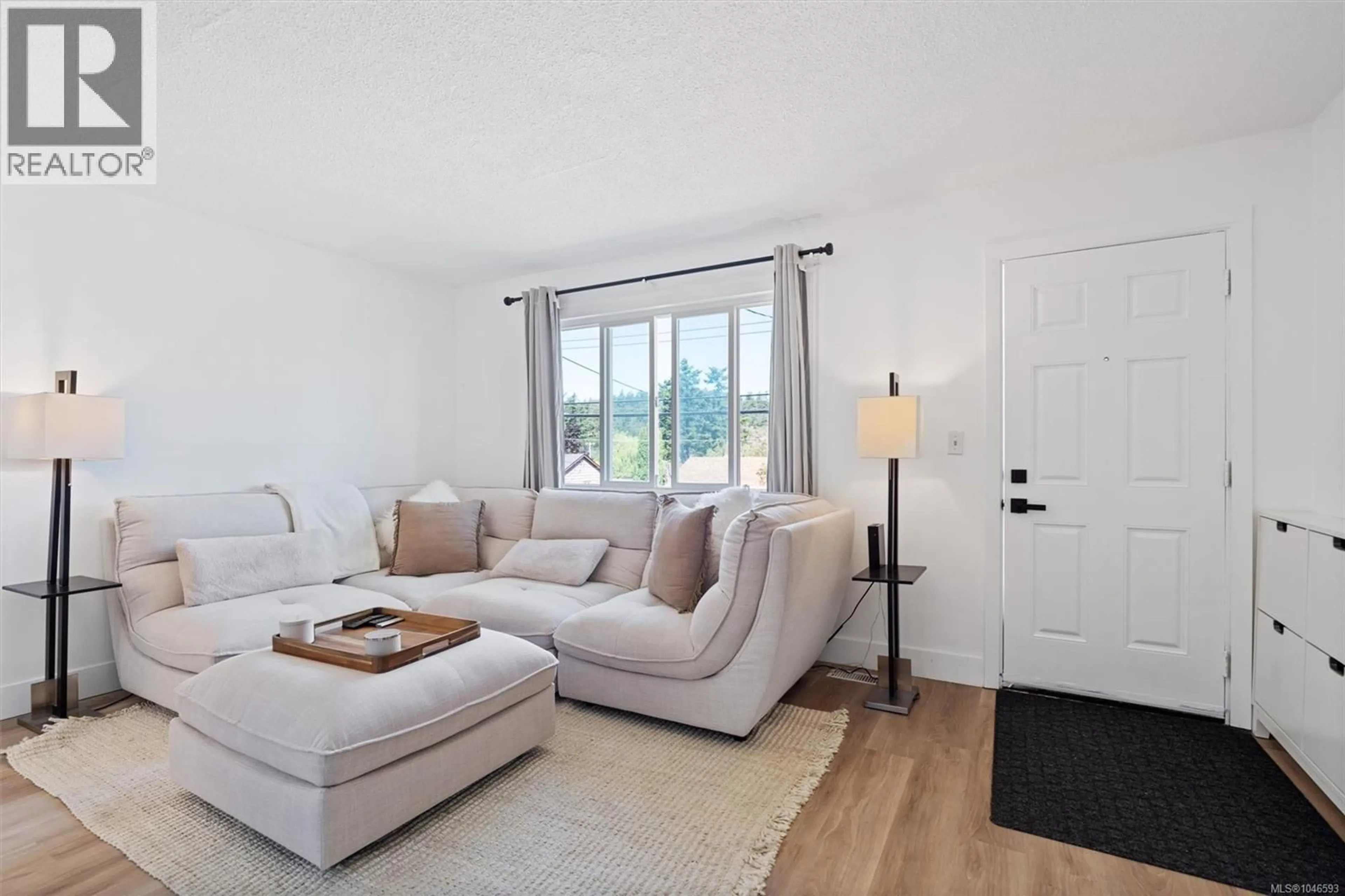 Living room with furniture, unknown for 1143 LOCKLEY ROAD, Esquimalt British Columbia V9A4S5