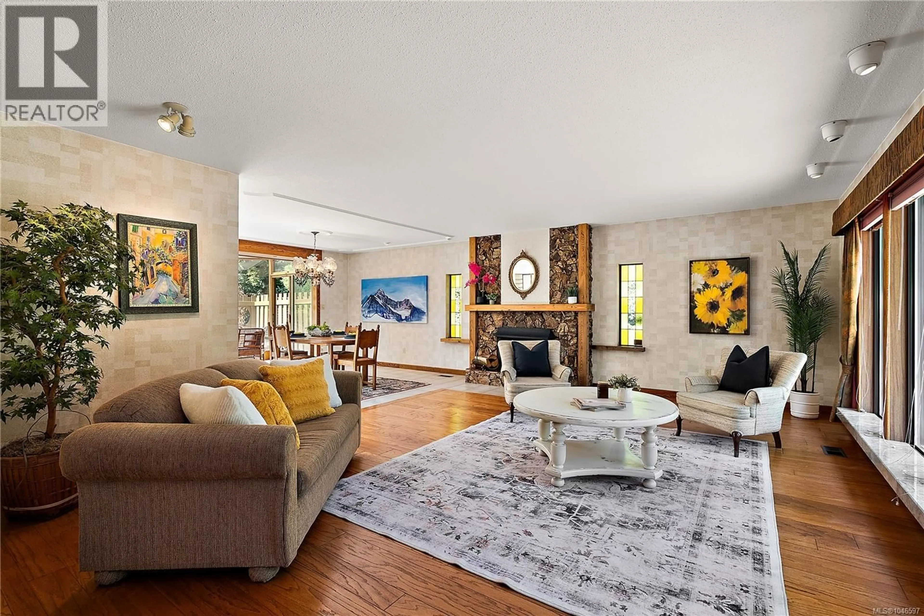 Living room with furniture, unknown for 3832 PERSIMMON DRIVE, Saanich British Columbia V8P3R9
