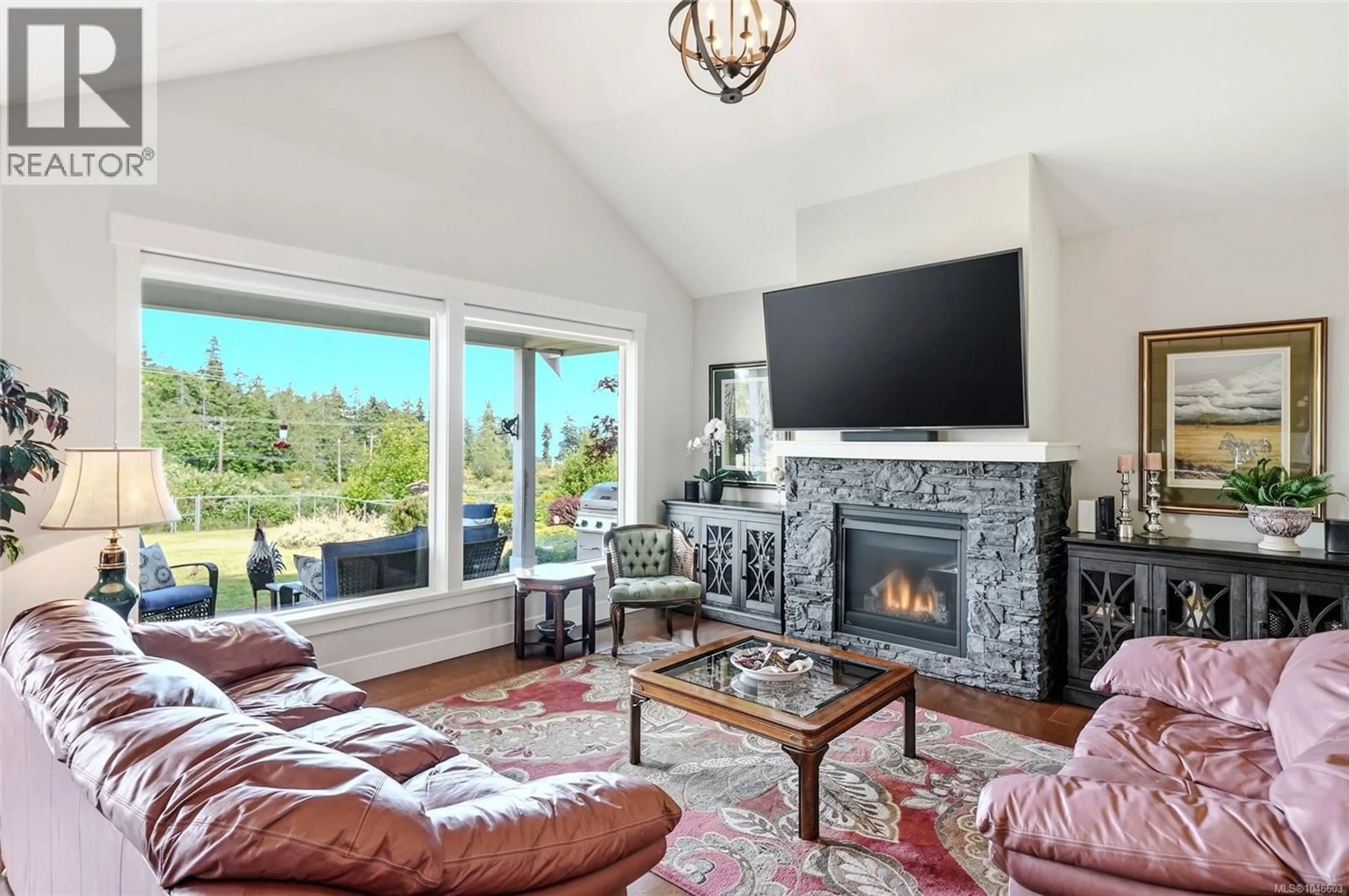Living room with furniture, ceramic/tile floor for 3861 CREEKSIDE DRIVE, Bowser British Columbia V0R1G0