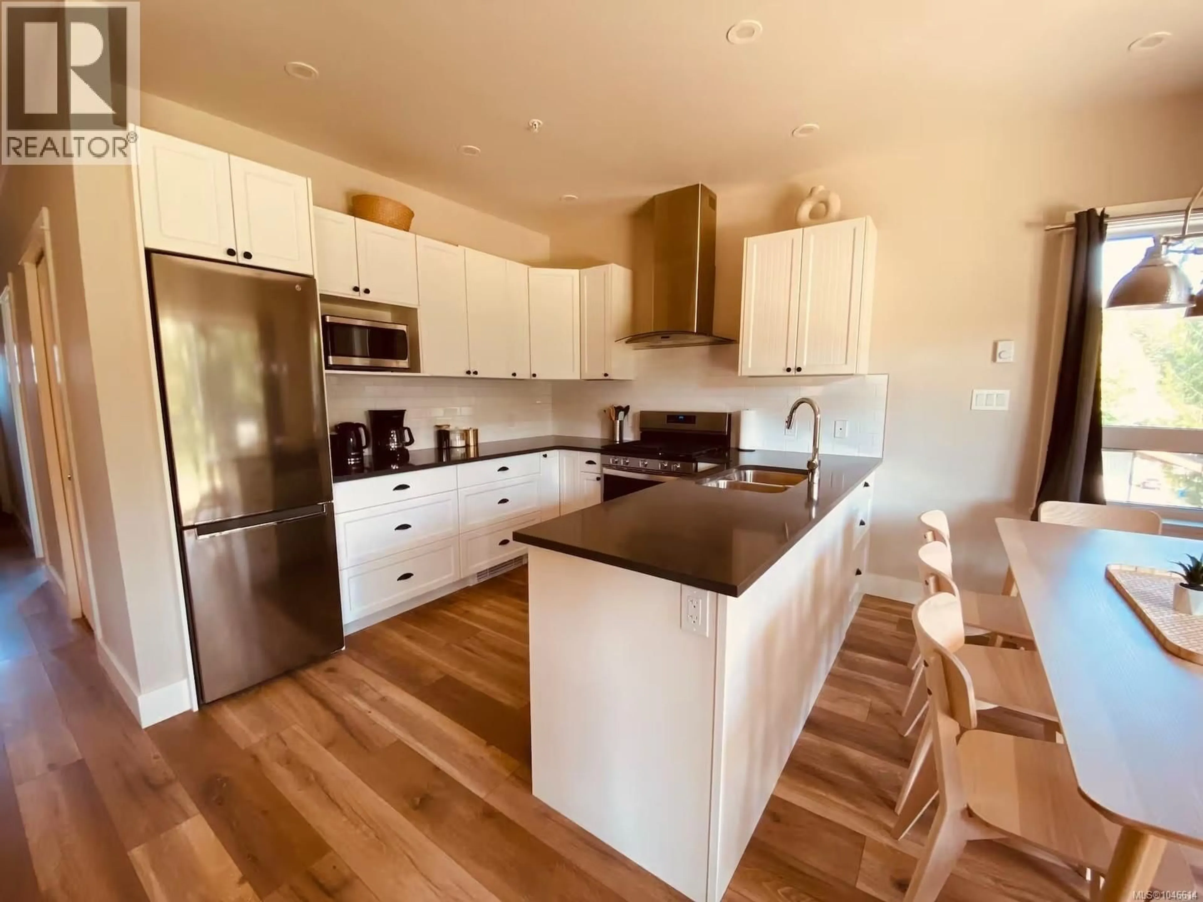 Open concept kitchen, wood/laminate floor for 217B - 6596 BAIRD ROAD, Port Renfrew British Columbia V0S1K0