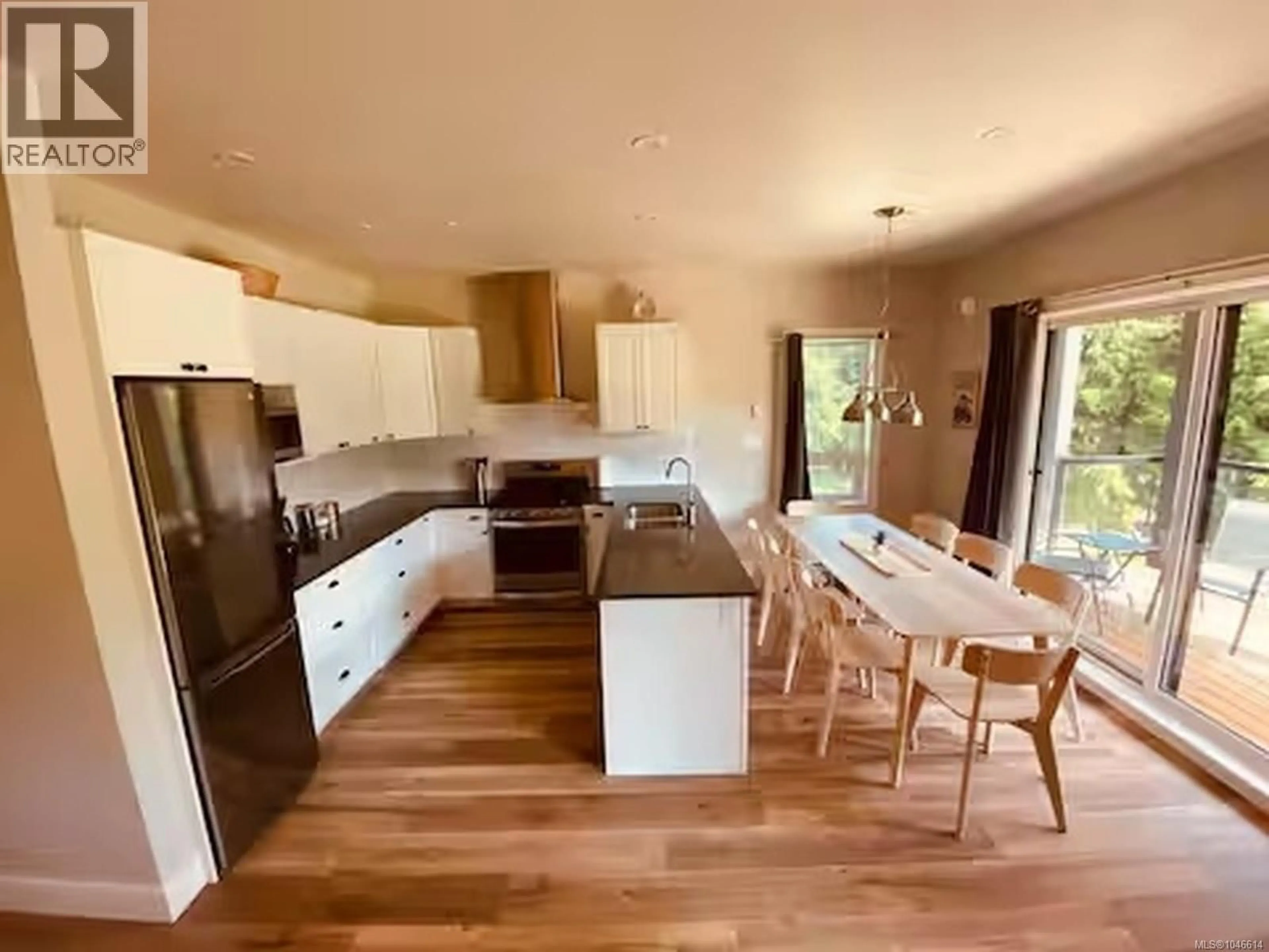 Open concept kitchen, wood/laminate floor for 217B - 6596 BAIRD ROAD, Port Renfrew British Columbia V0S1K0