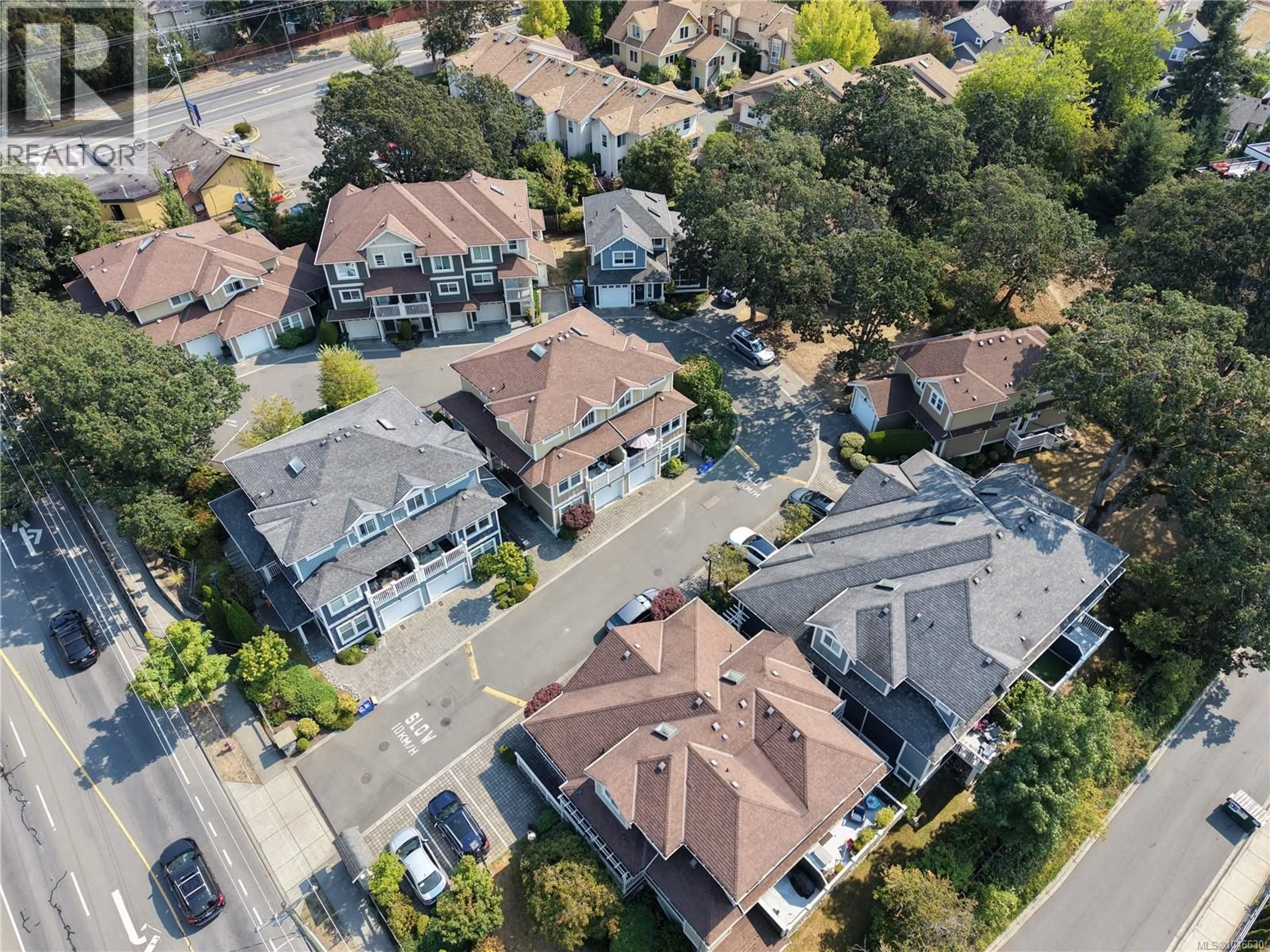 A pic from outside/outdoor area/front of a property/back of a property/a pic from drone, street for 7 - 4583 WILKINSON ROAD, Saanich British Columbia V8Z5C3
