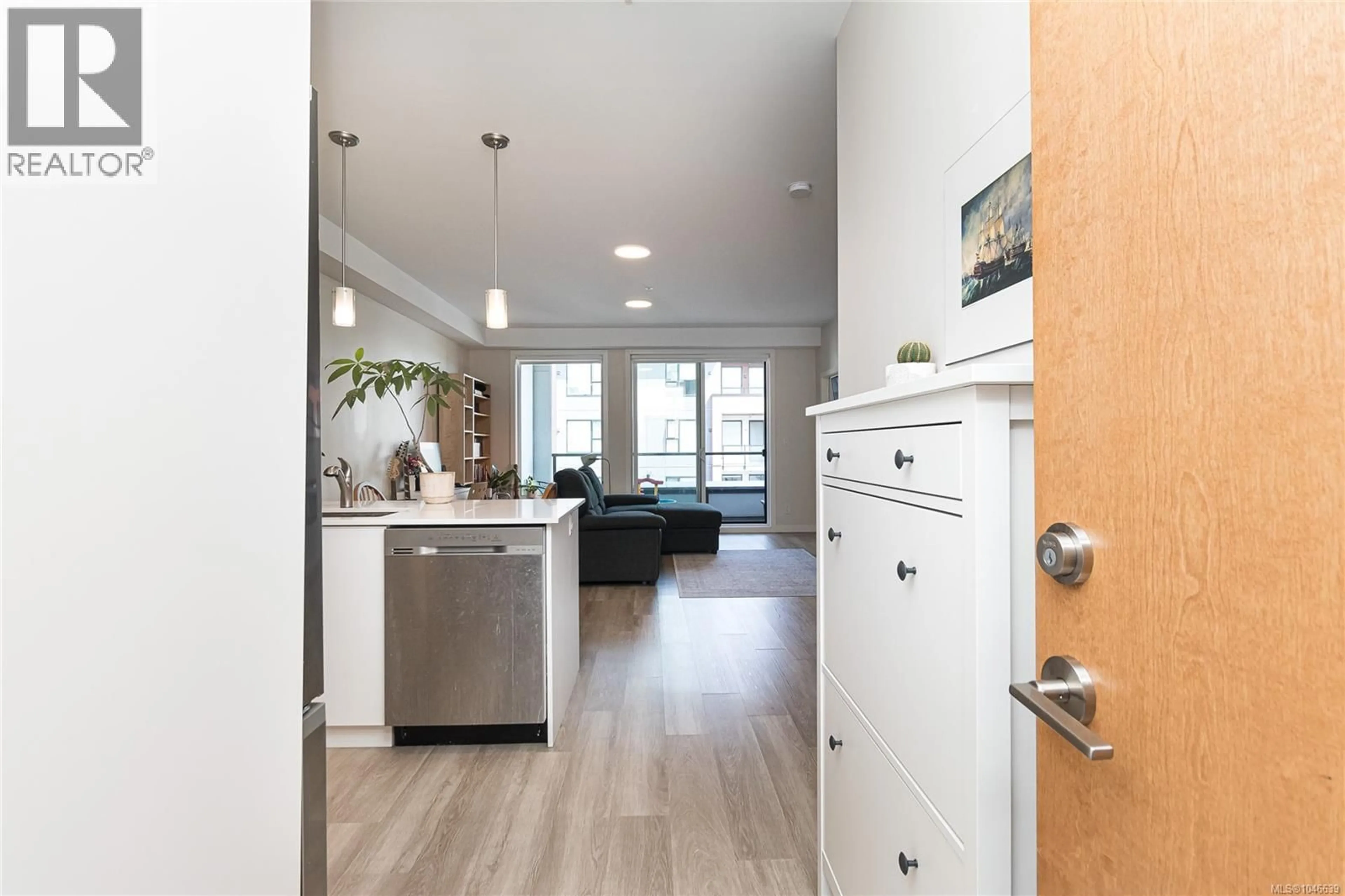 Open concept kitchen, wood/laminate floor for 503 - 815 ORONO AVENUE, Langford British Columbia V9B2T9