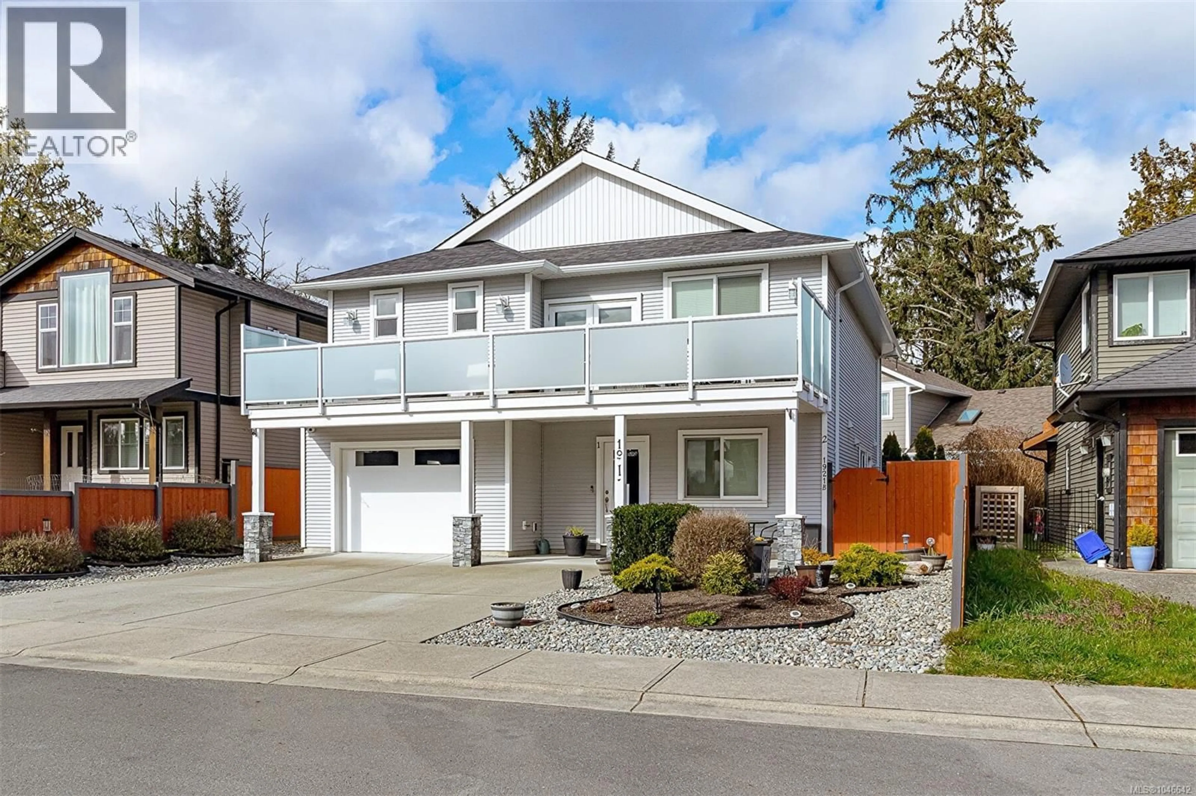 Home with vinyl exterior material, street for 1921 TOMINNY ROAD, Sooke British Columbia V9Z0P8