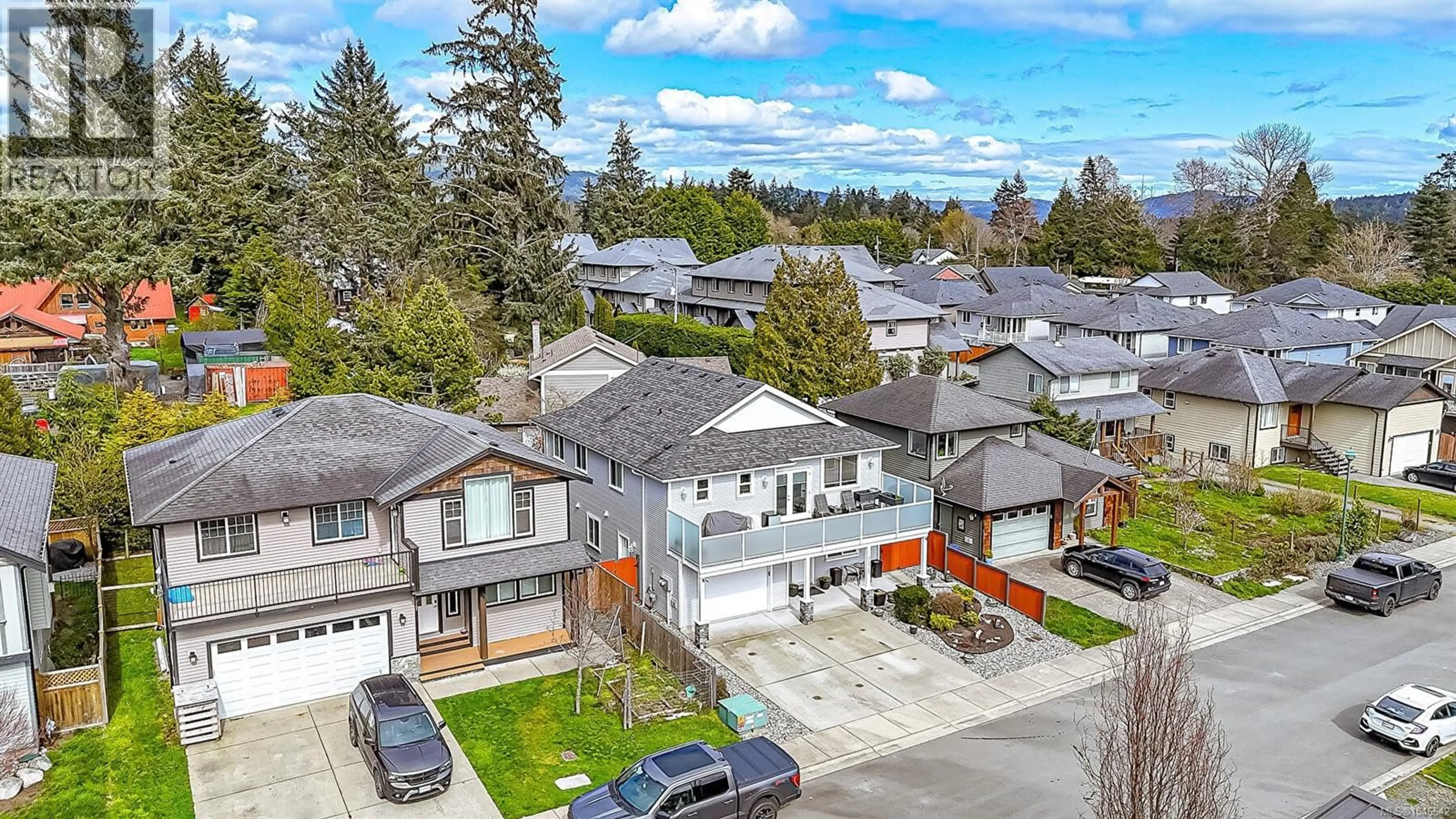 A pic from outside/outdoor area/front of a property/back of a property/a pic from drone, street for 1921 TOMINNY ROAD, Sooke British Columbia V9Z0P8
