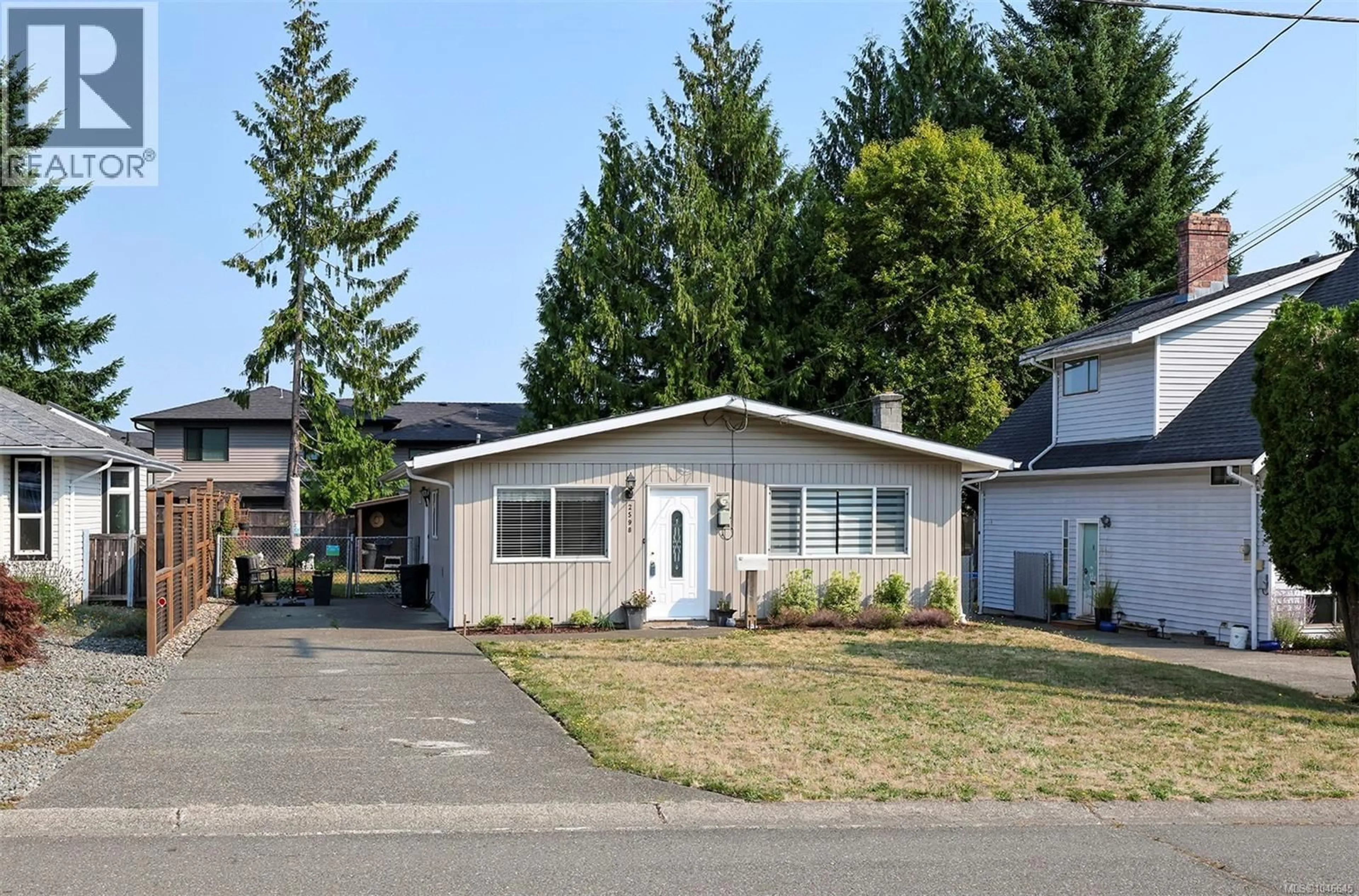Home with vinyl exterior material, street for 2598 WILLARD AVENUE, Cumberland British Columbia V0R1S0