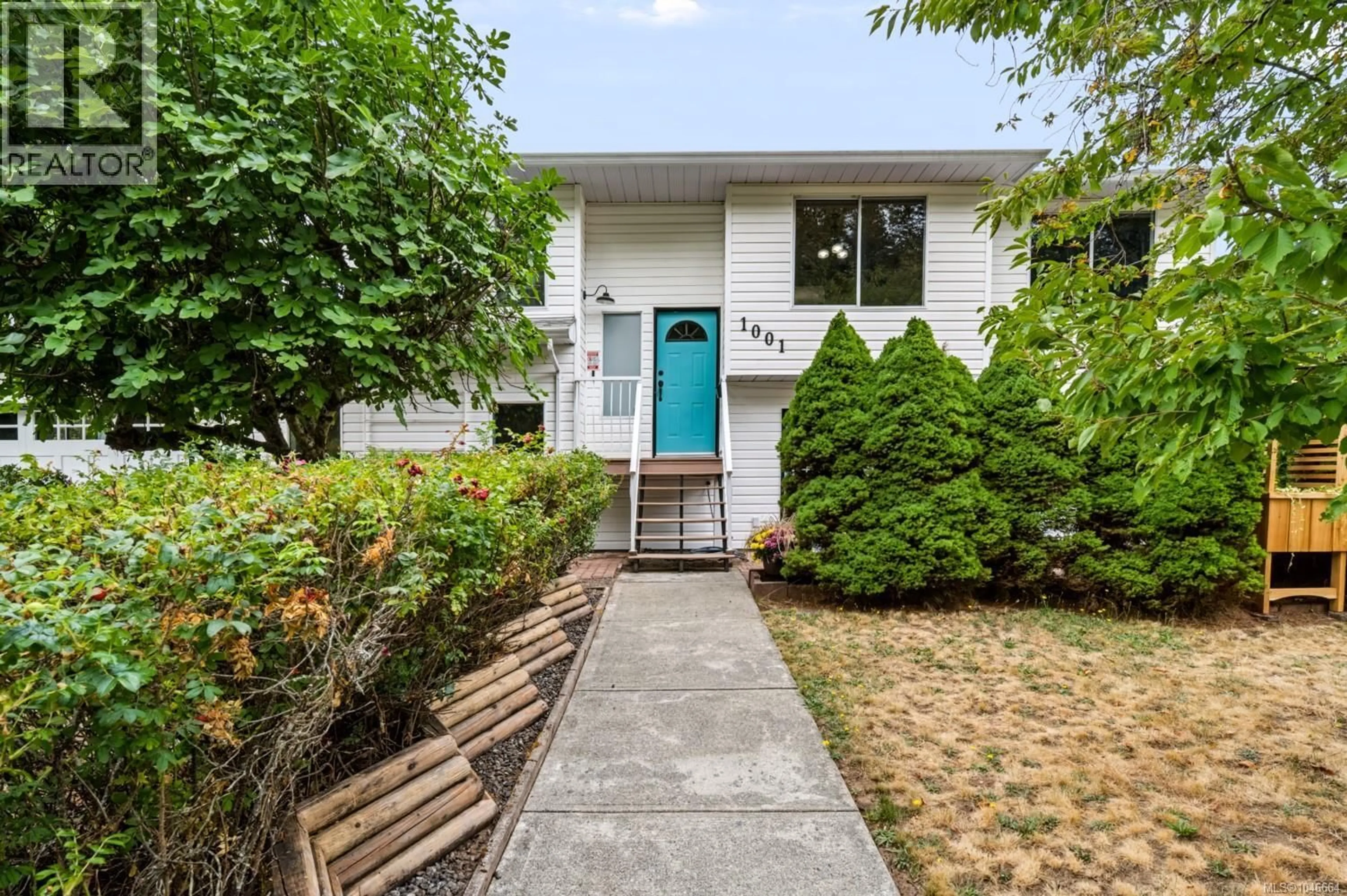 Home with vinyl exterior material, street for 1001 TIMBERWOOD DRIVE, Nanaimo British Columbia V9R6N9