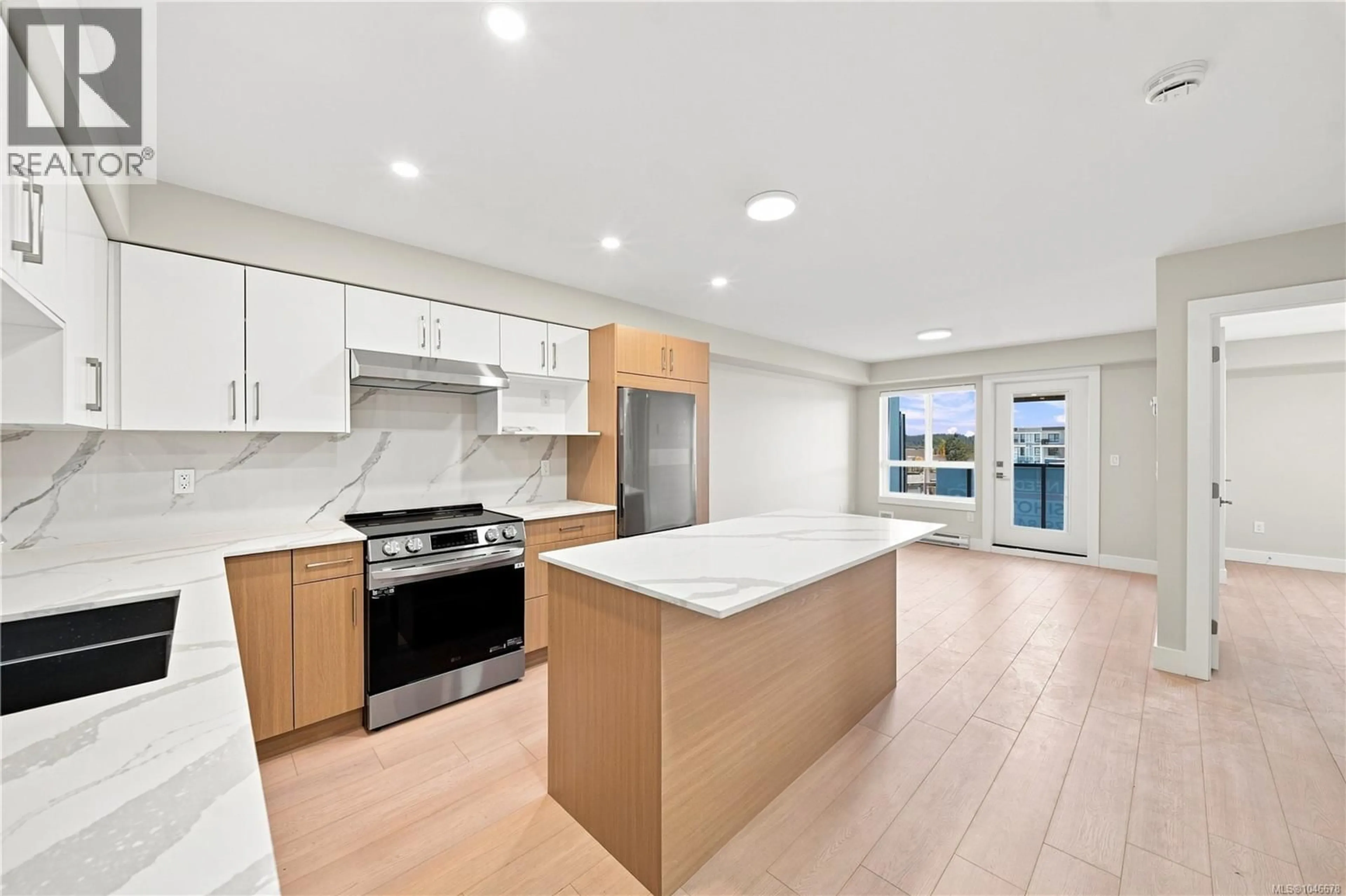 Open concept kitchen, ceramic/tile floor for 309 - 171 JENSEN AVENUE WEST, Parksville British Columbia V9P1K3