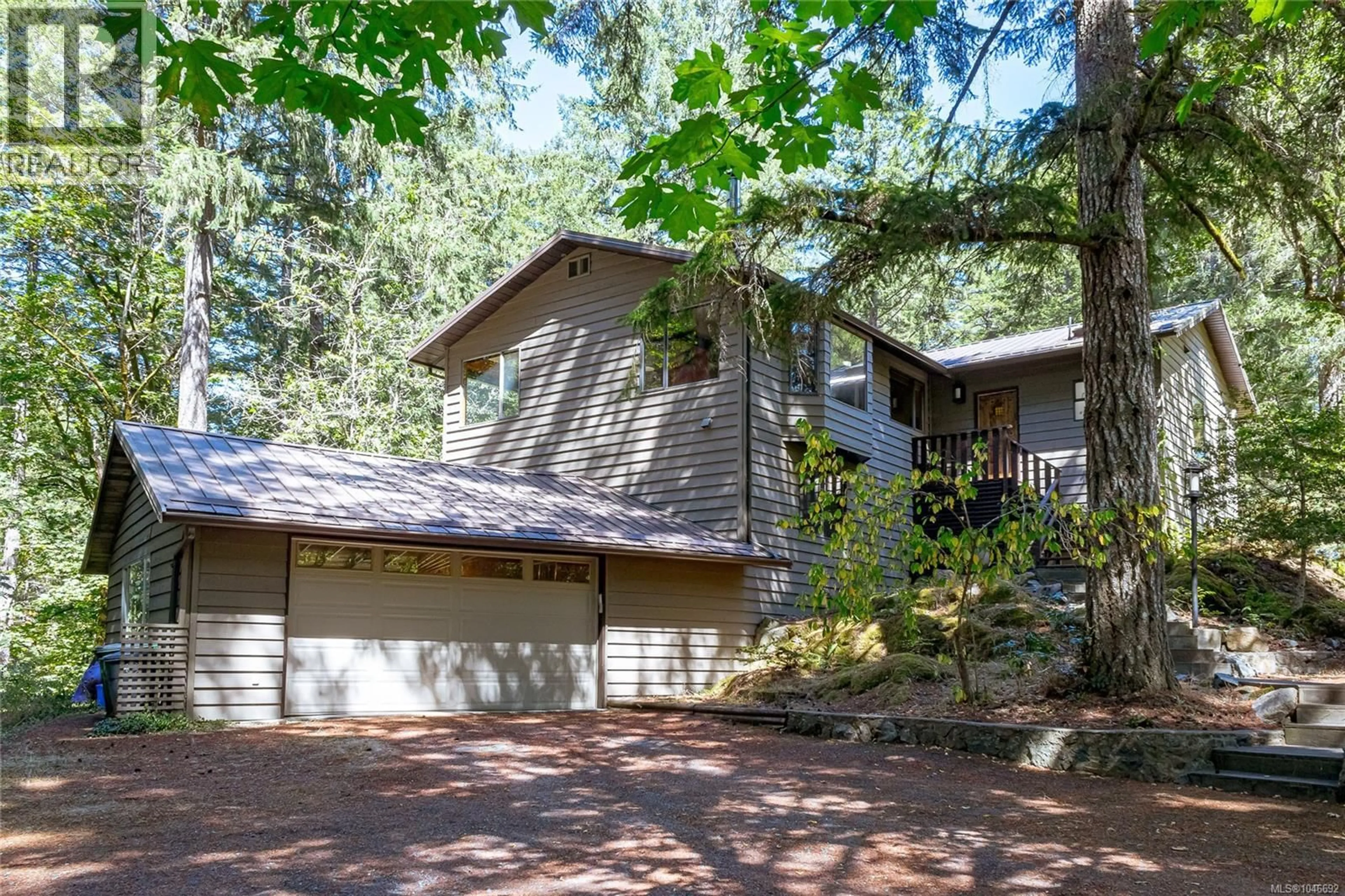 Home with vinyl exterior material, forest/trees view for 100 VIADUCT AVENUE WEST, Saanich British Columbia V9E1J3
