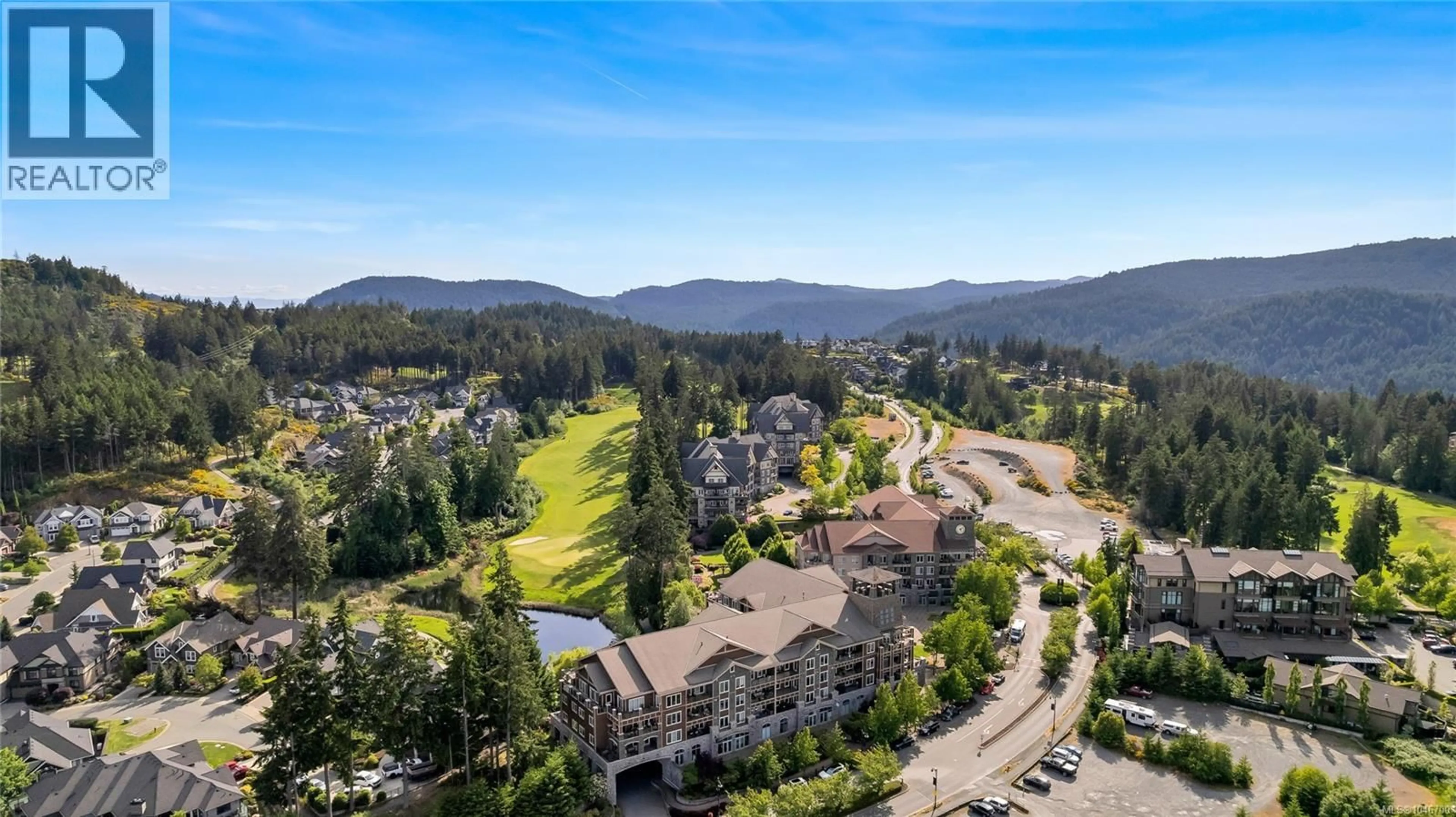 A pic from outside/outdoor area/front of a property/back of a property/a pic from drone, mountain view for 304 - 1325 BEAR MOUNTAIN PARKWAY, Langford British Columbia V9B6T8