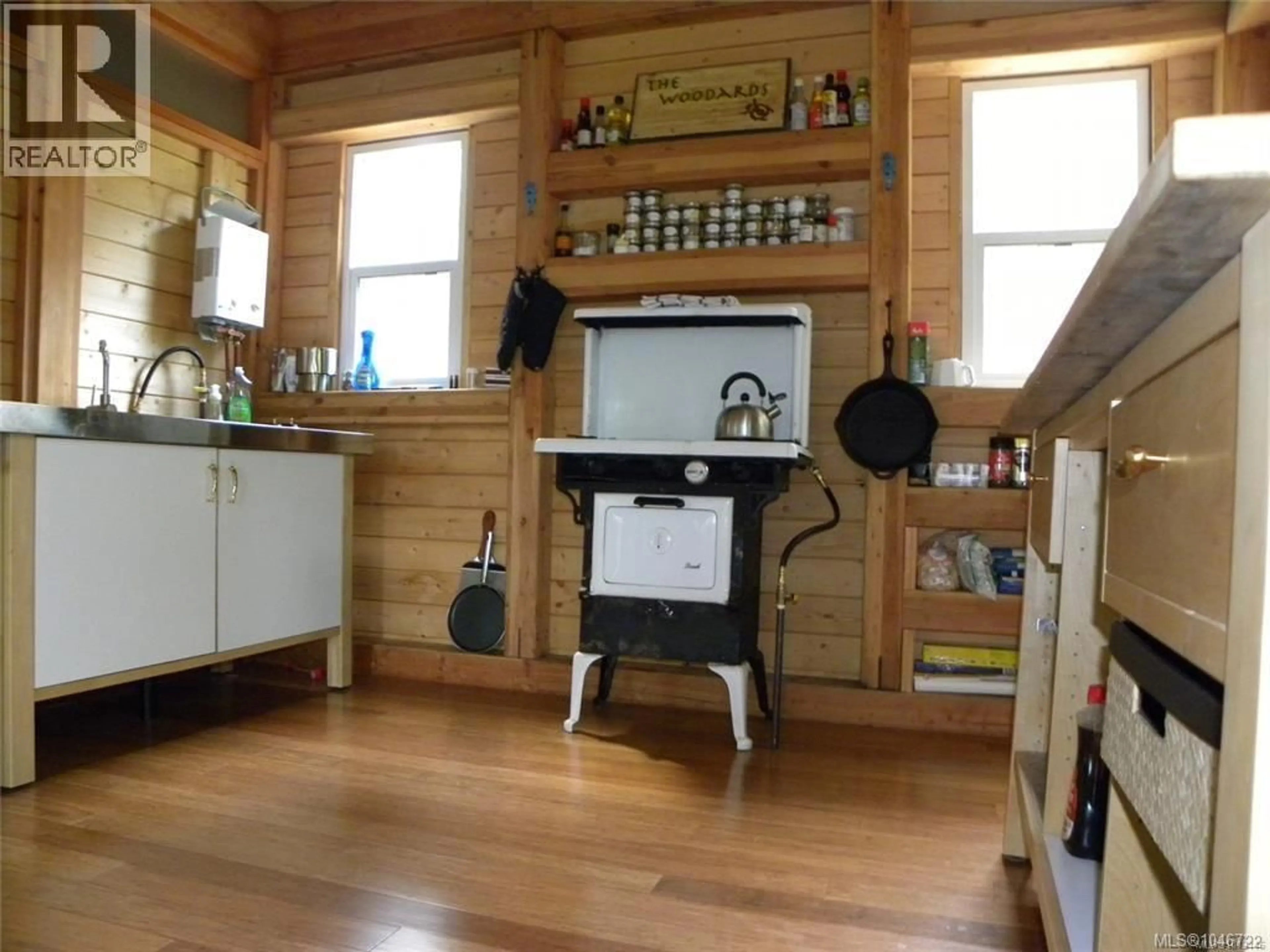 Standard kitchen, wood/laminate floor for 66 SPRING BAY ROAD, Lasqueti Island British Columbia V0R2J0