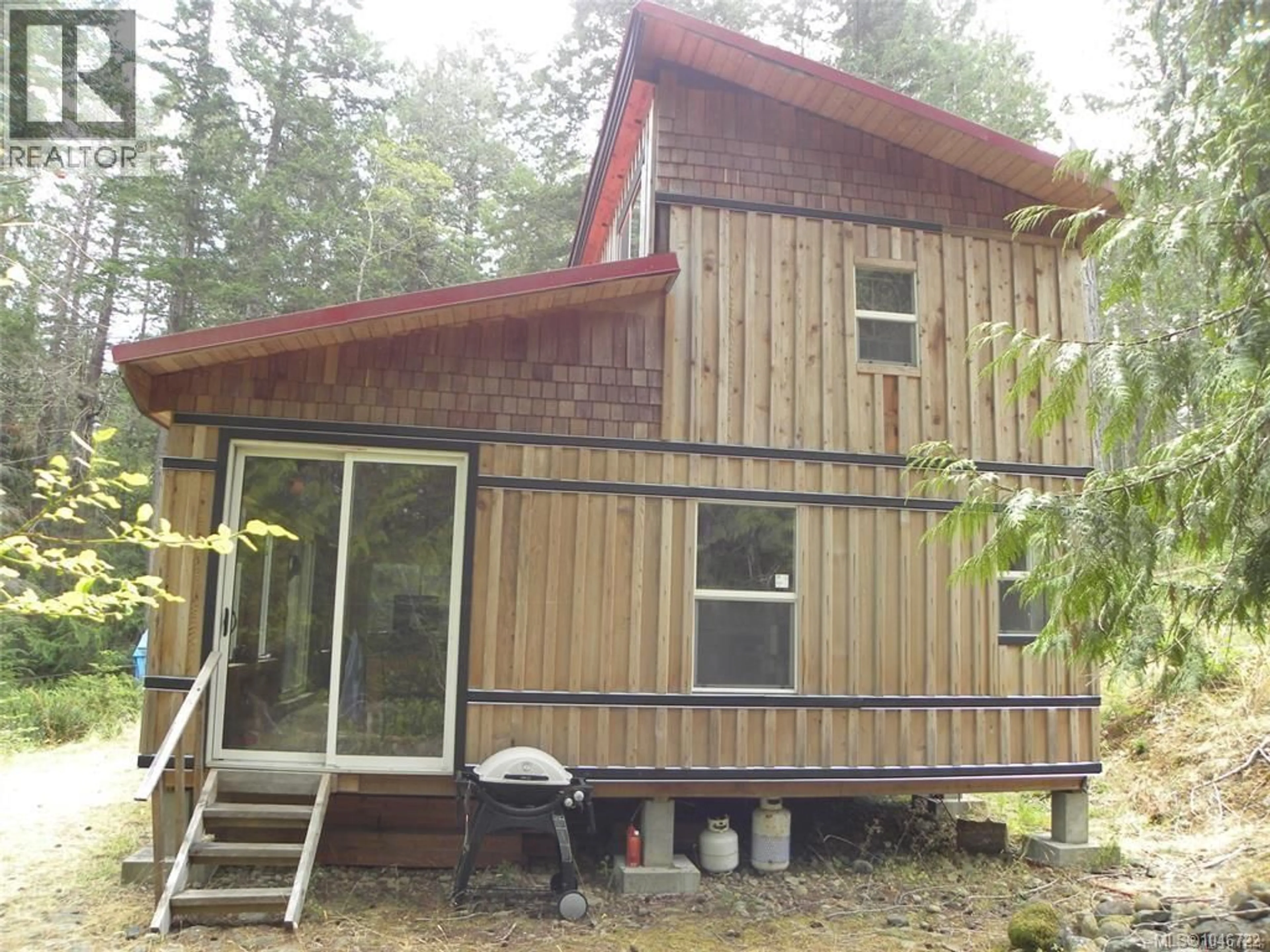 Home with vinyl exterior material, building for 66 SPRING BAY ROAD, Lasqueti Island British Columbia V0R2J0