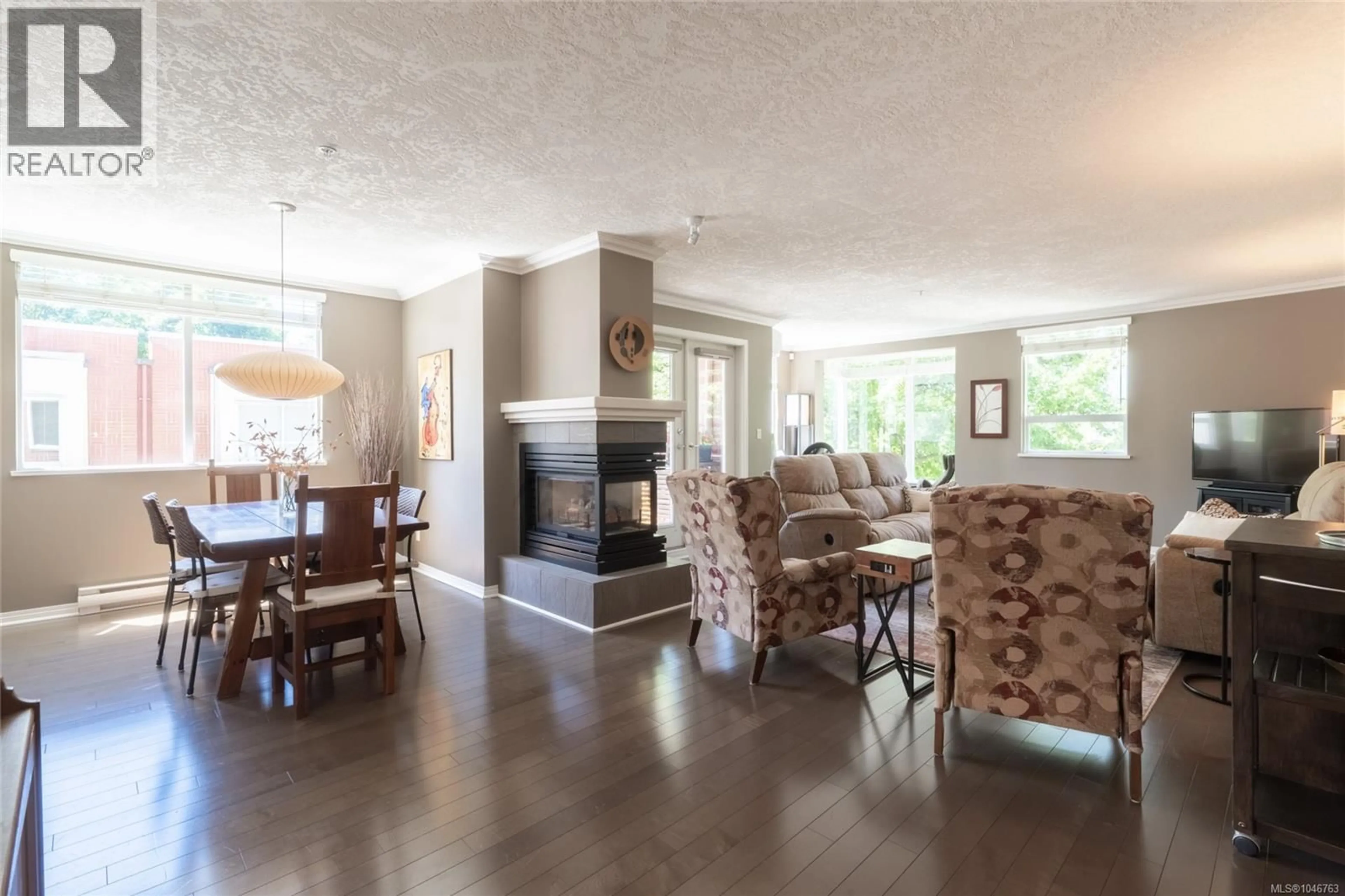 Dining room, wood/laminate floor for 201 - 380 WATERFRONT CRESCENT, Victoria British Columbia V8T5K3