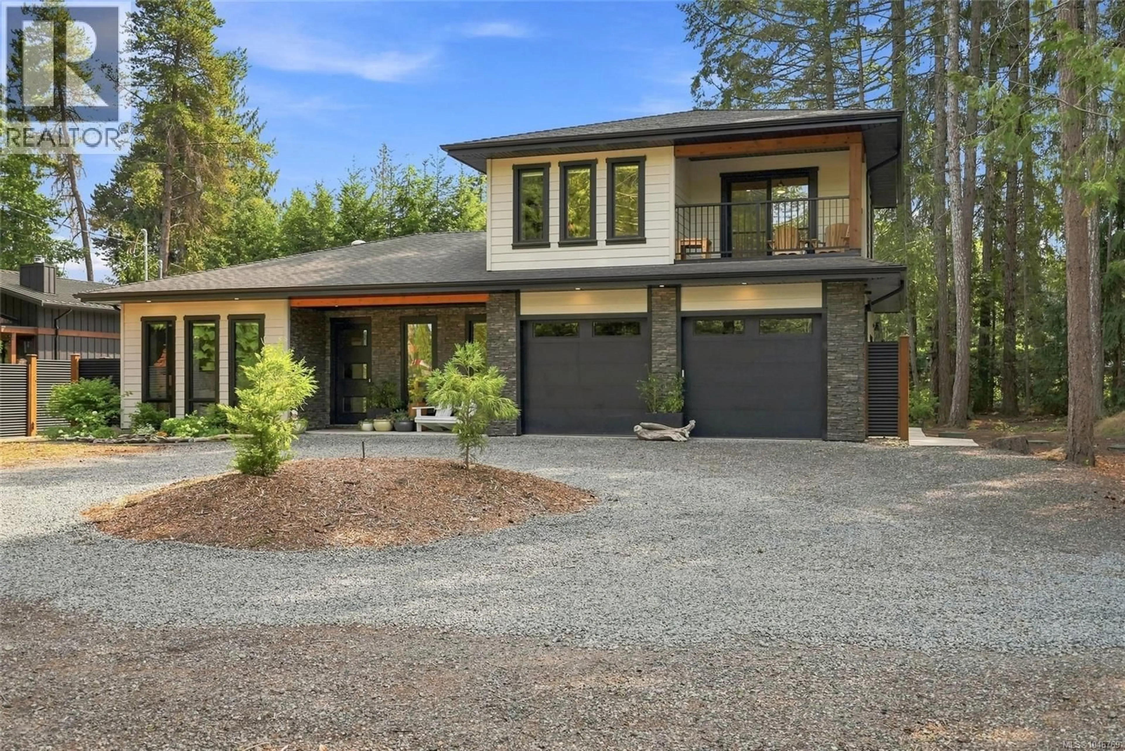 Home with brick exterior material, street for 935 MEADOWLARK PLACE, Qualicum Beach British Columbia V9K1M6