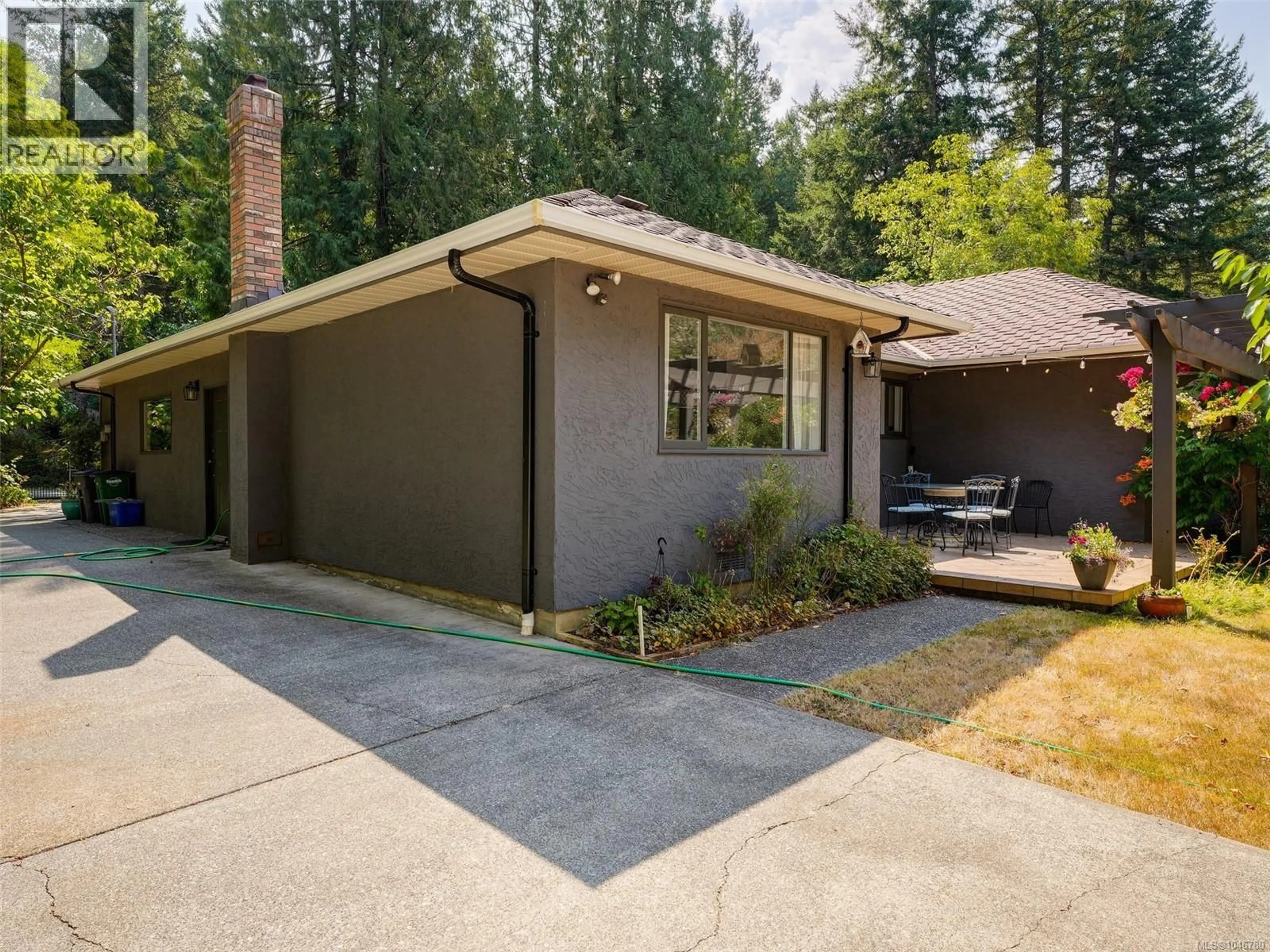 Home with brick exterior material, street for 4860 EXCELSIOR ROAD, Saanich British Columbia V9E2E5