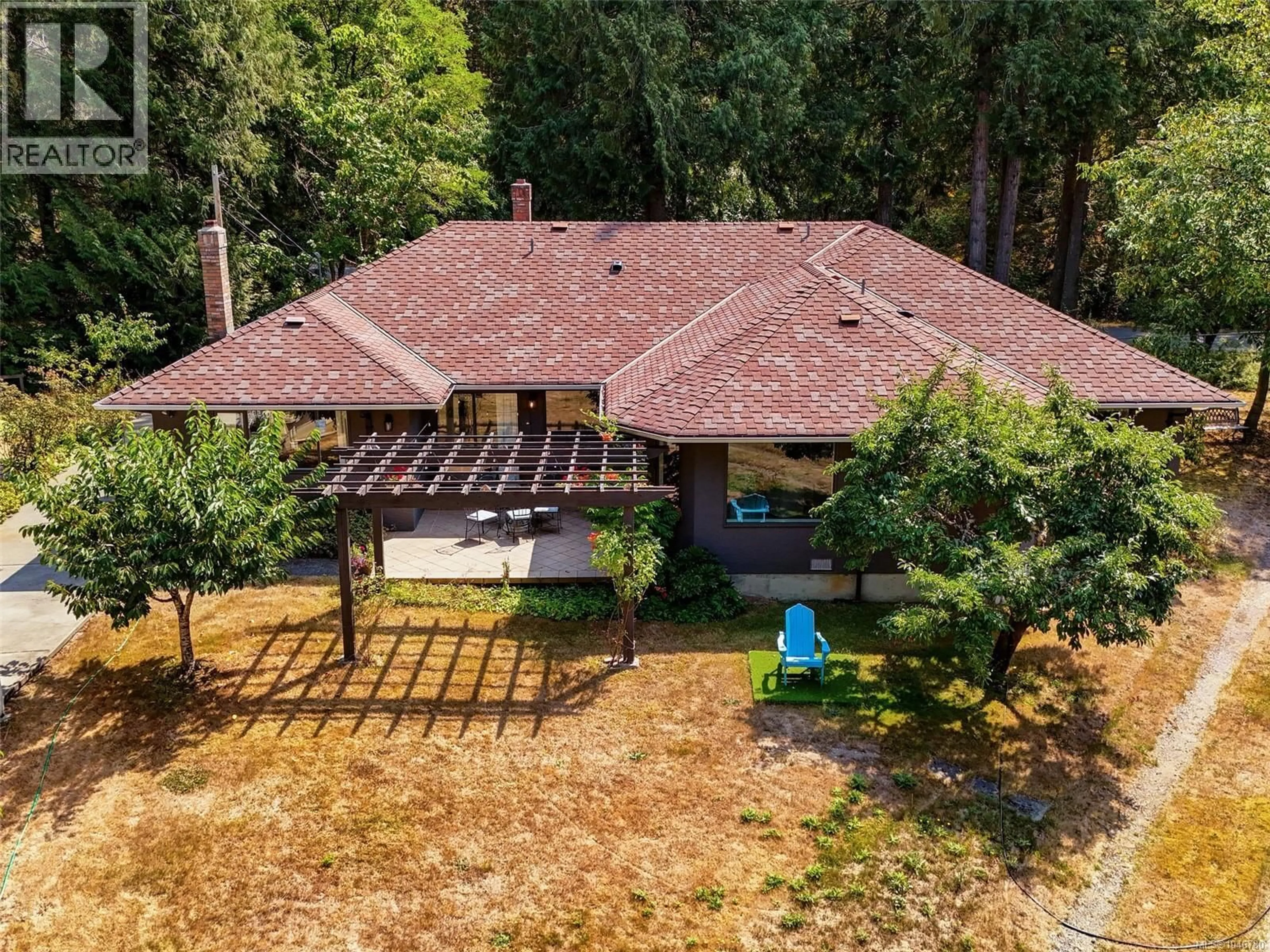 A pic from outside/outdoor area/front of a property/back of a property/a pic from drone, forest/trees view for 4860 EXCELSIOR ROAD, Saanich British Columbia V9E2E5