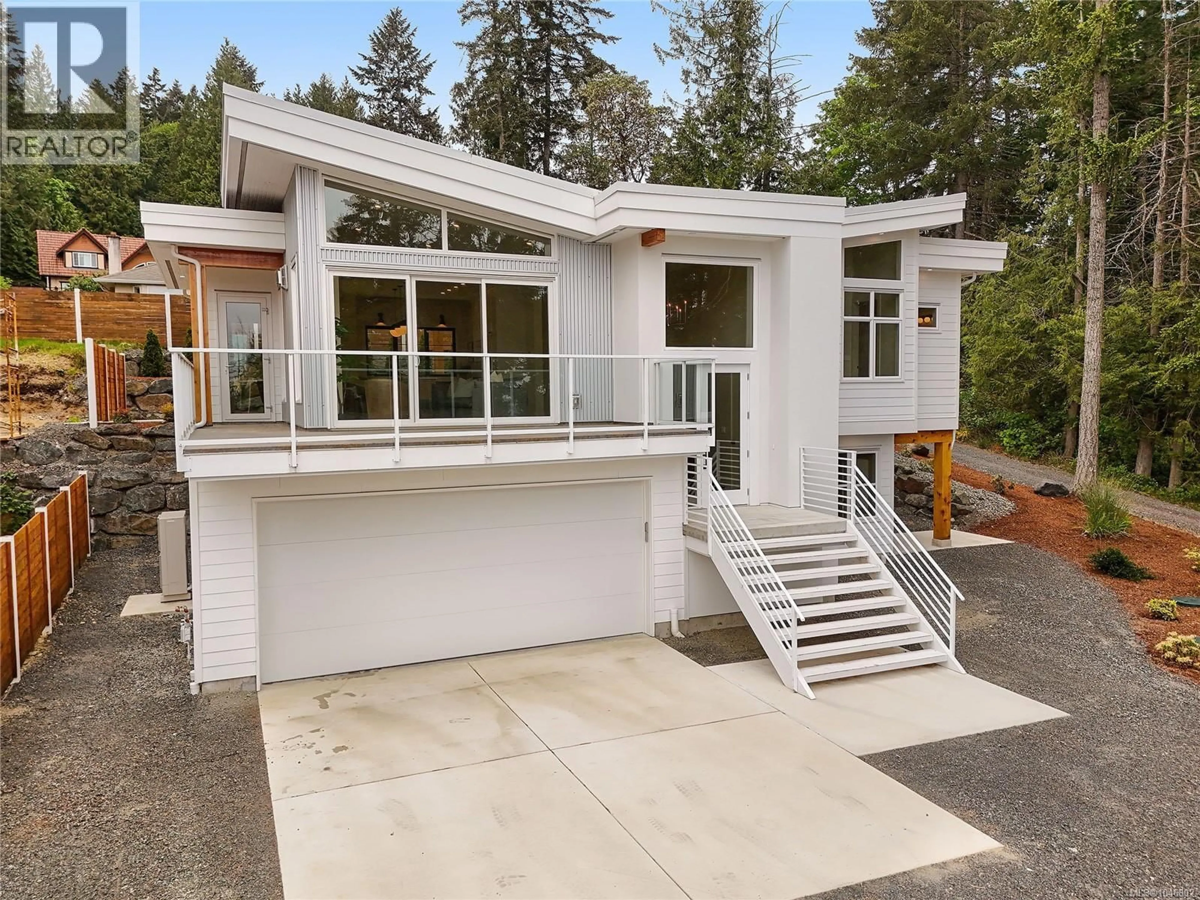 Home with vinyl exterior material, street for 2528 MILL BAY ROAD, Mill Bay British Columbia V0R2P1
