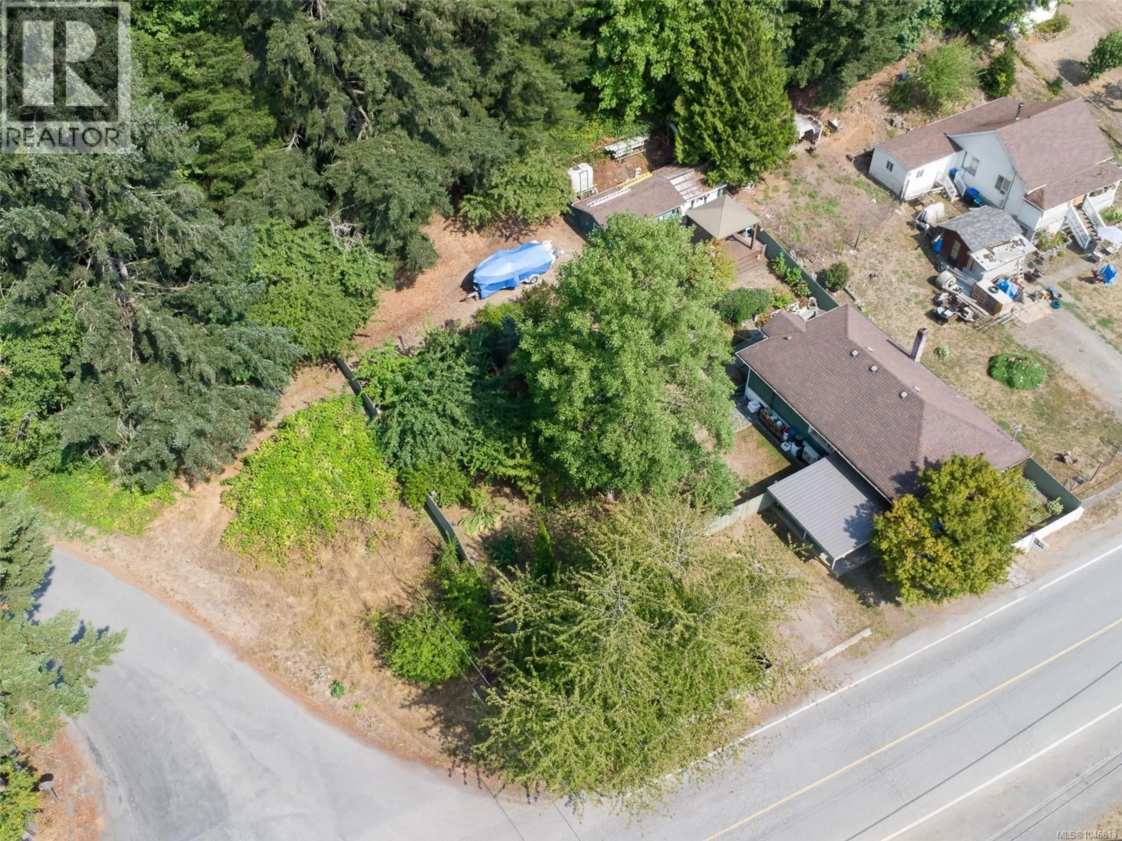 A pic from outside/outdoor area/front of a property/back of a property/a pic from drone, forest/trees view for 2148 DICK AVENUE, Nanaimo British Columbia V9X1R6