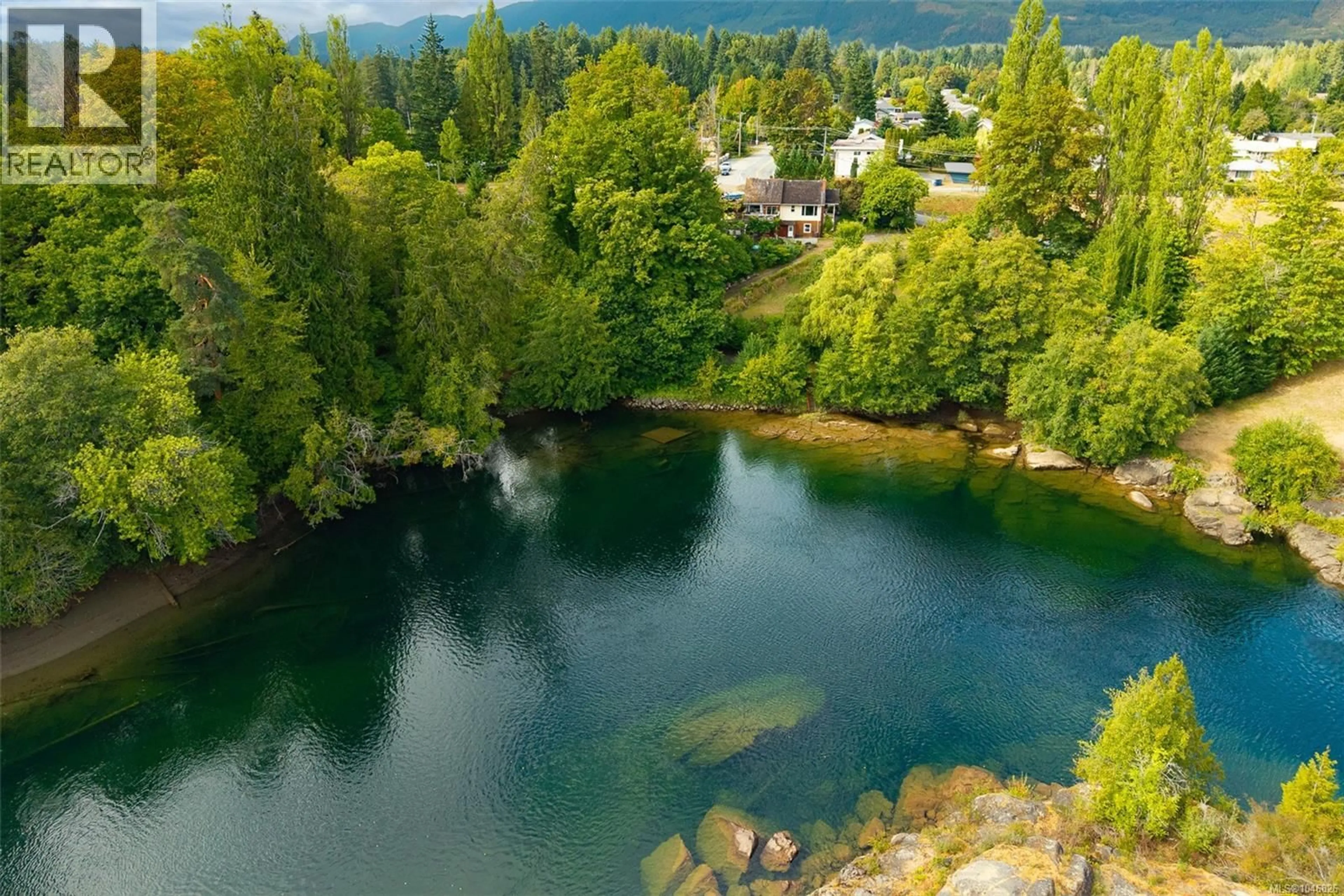 A pic from outside/outdoor area/front of a property/back of a property/a pic from drone, water/lake/river/ocean view for 5330 FALLS STREET, Port Alberni British Columbia V9Y7K2