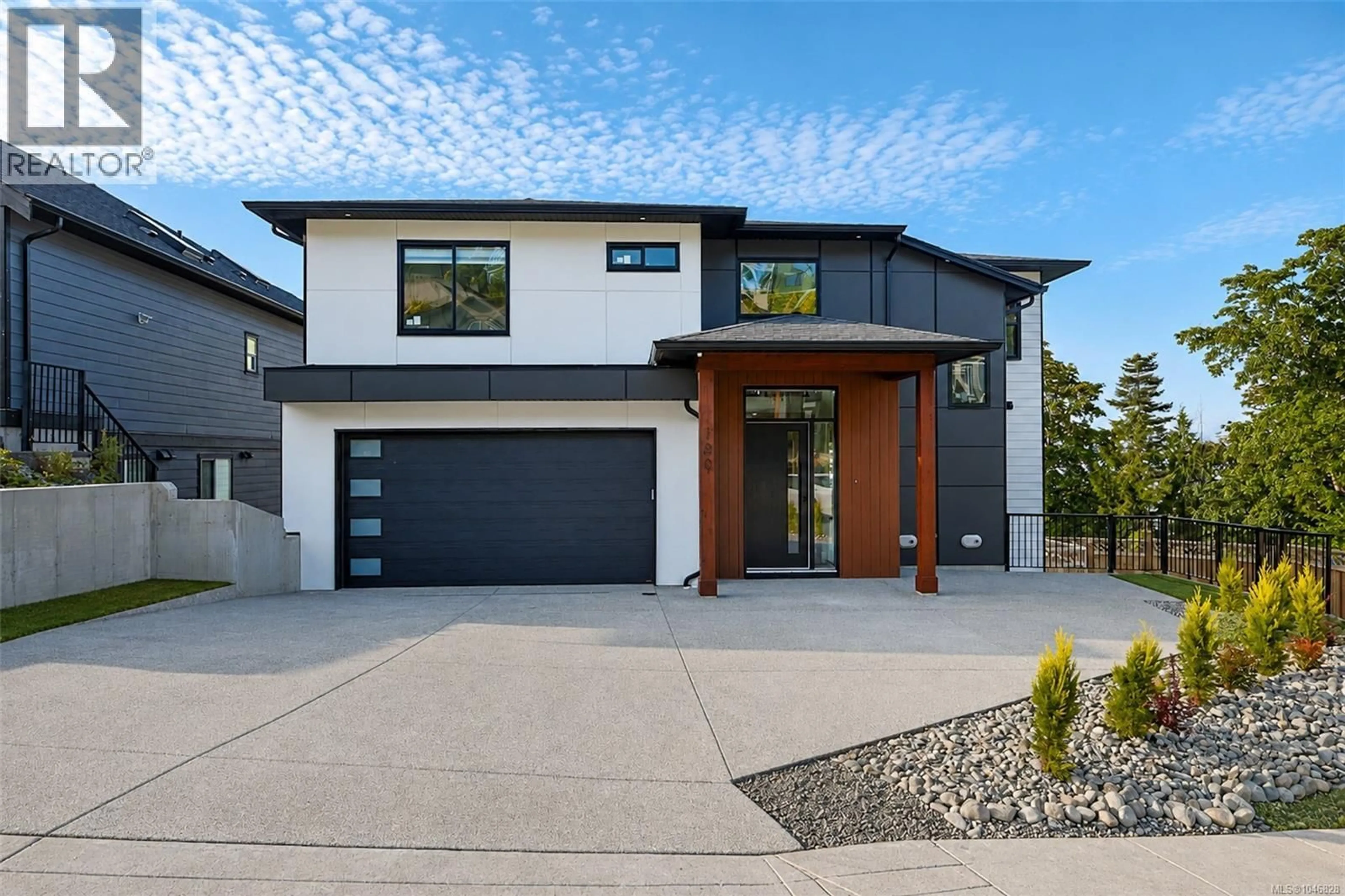 Home with brick exterior material, street for 100 ROYAL PACIFIC WAY, Nanaimo British Columbia V9T5L7