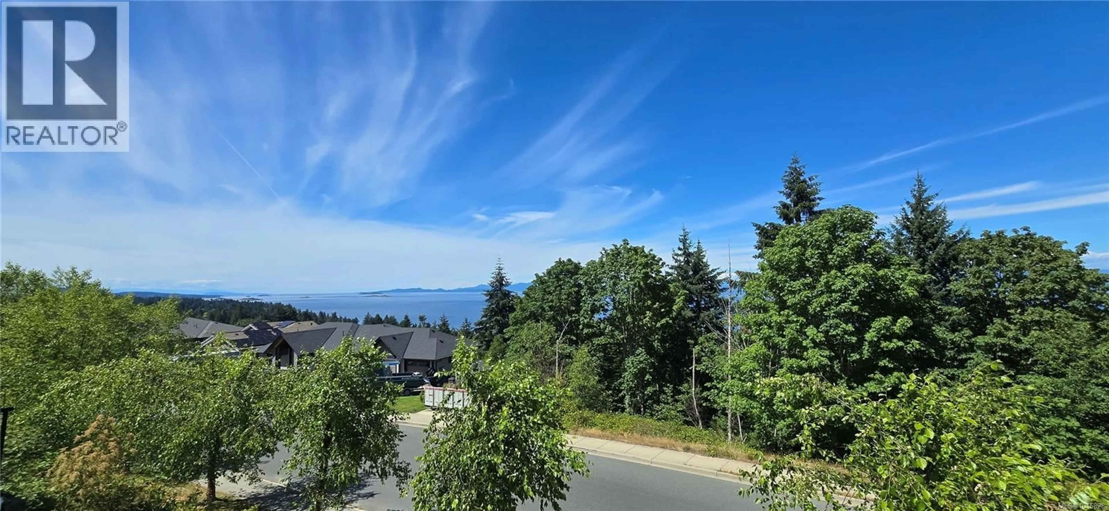 A pic from outside/outdoor area/front of a property/back of a property/a pic from drone, mountain view for 100 ROYAL PACIFIC WAY, Nanaimo British Columbia V9T5L7