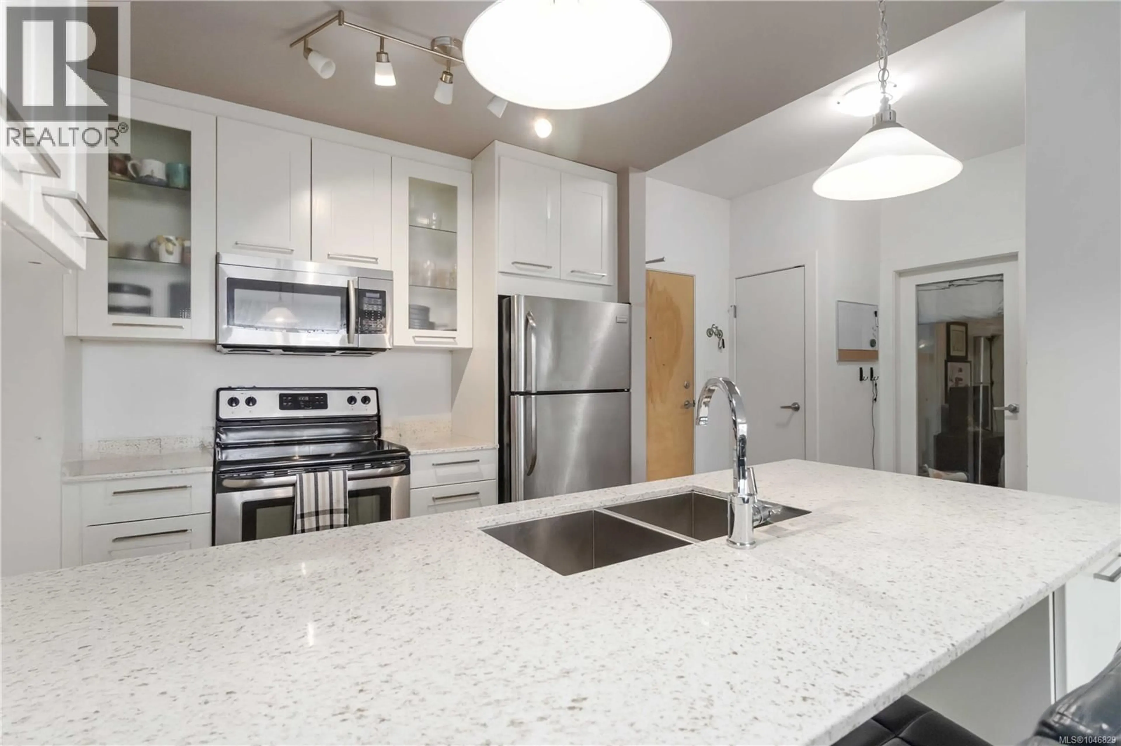 Open concept kitchen, ceramic/tile floor for 420 - 2871 JACKLIN ROAD, Langford British Columbia V9B5R8