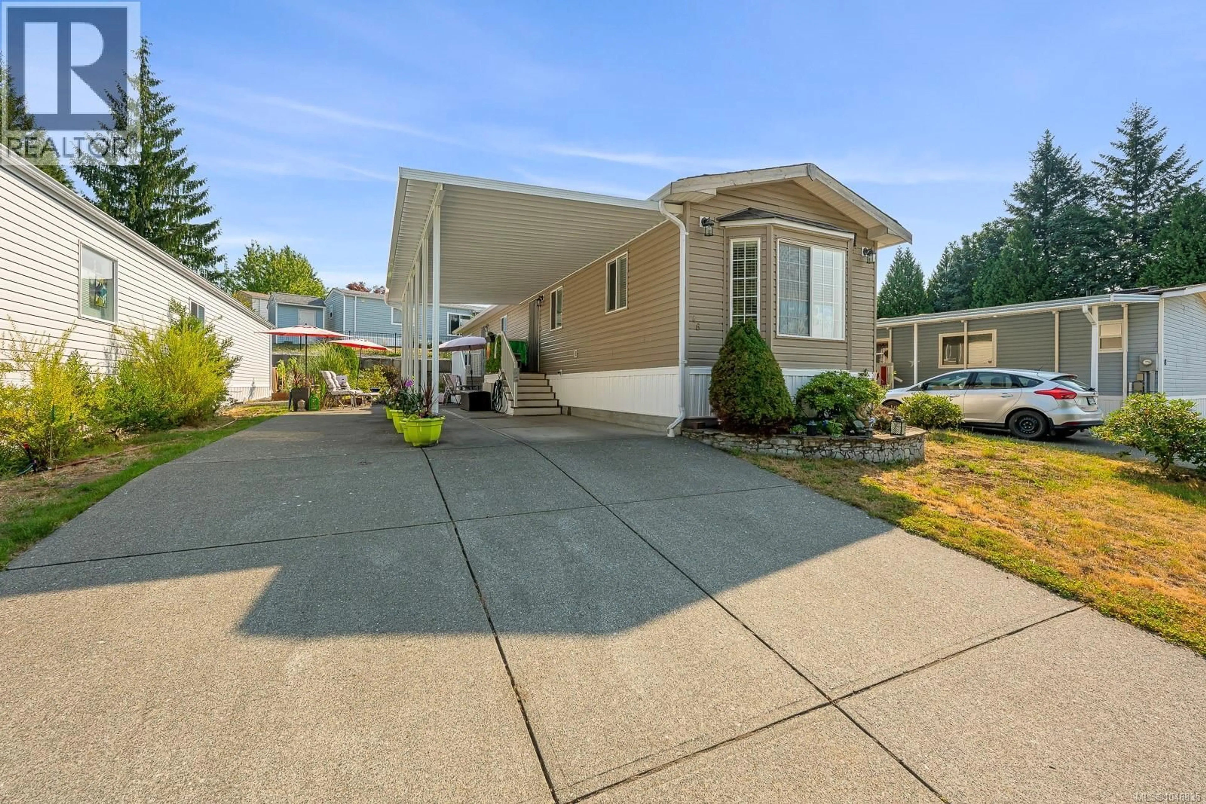 Home with vinyl exterior material, street for 46 - 4714 MUIR ROAD, Courtenay British Columbia V9N8Z6
