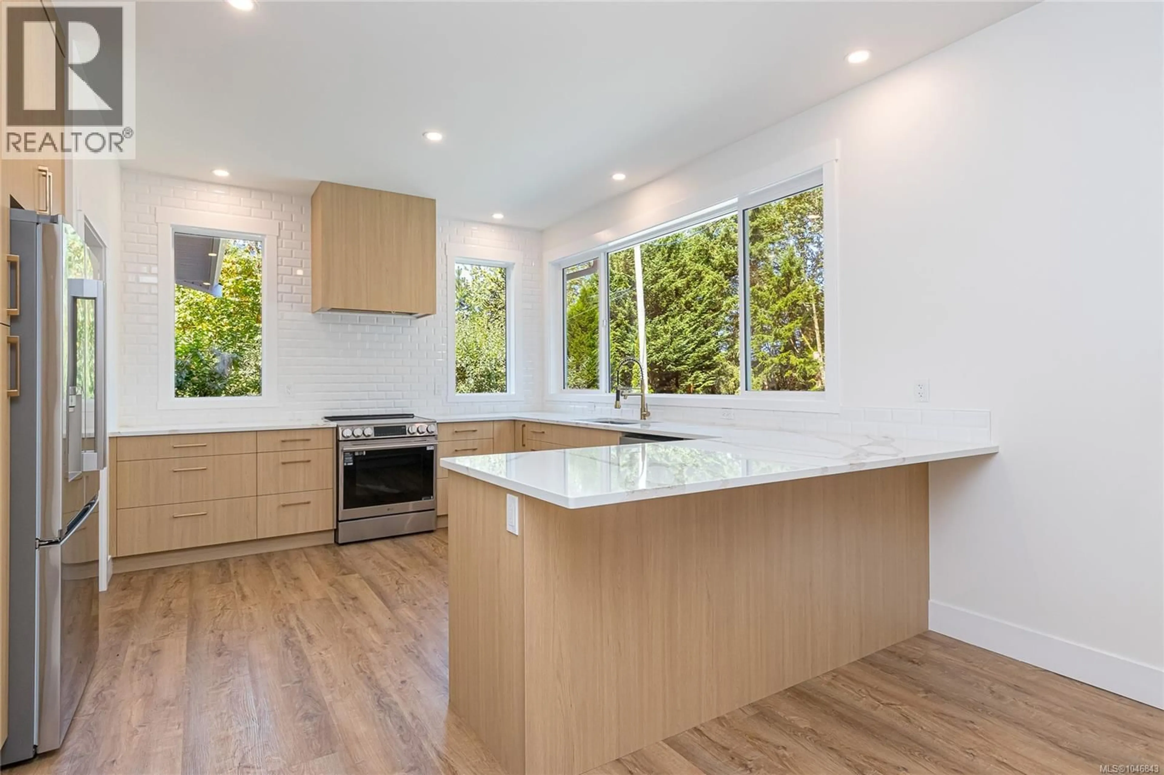 Open concept kitchen, wood/laminate floor for 7421 WESTHOLME ROAD, Westholme British Columbia V0R3C0