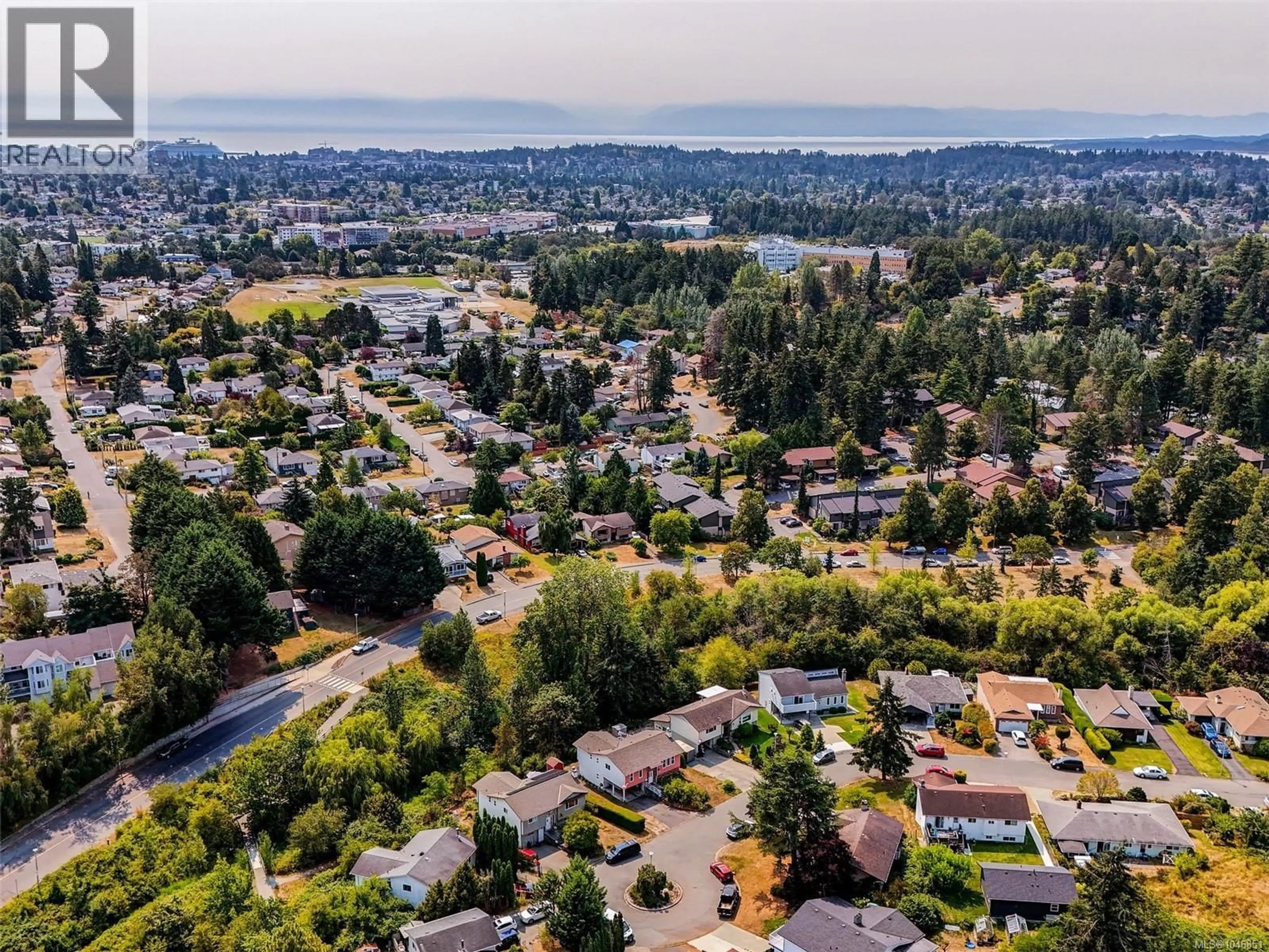 A pic from outside/outdoor area/front of a property/back of a property/a pic from drone, water/lake/river/ocean view for 3960 ARLENE PLACE, Saanich British Columbia V8Z6H9