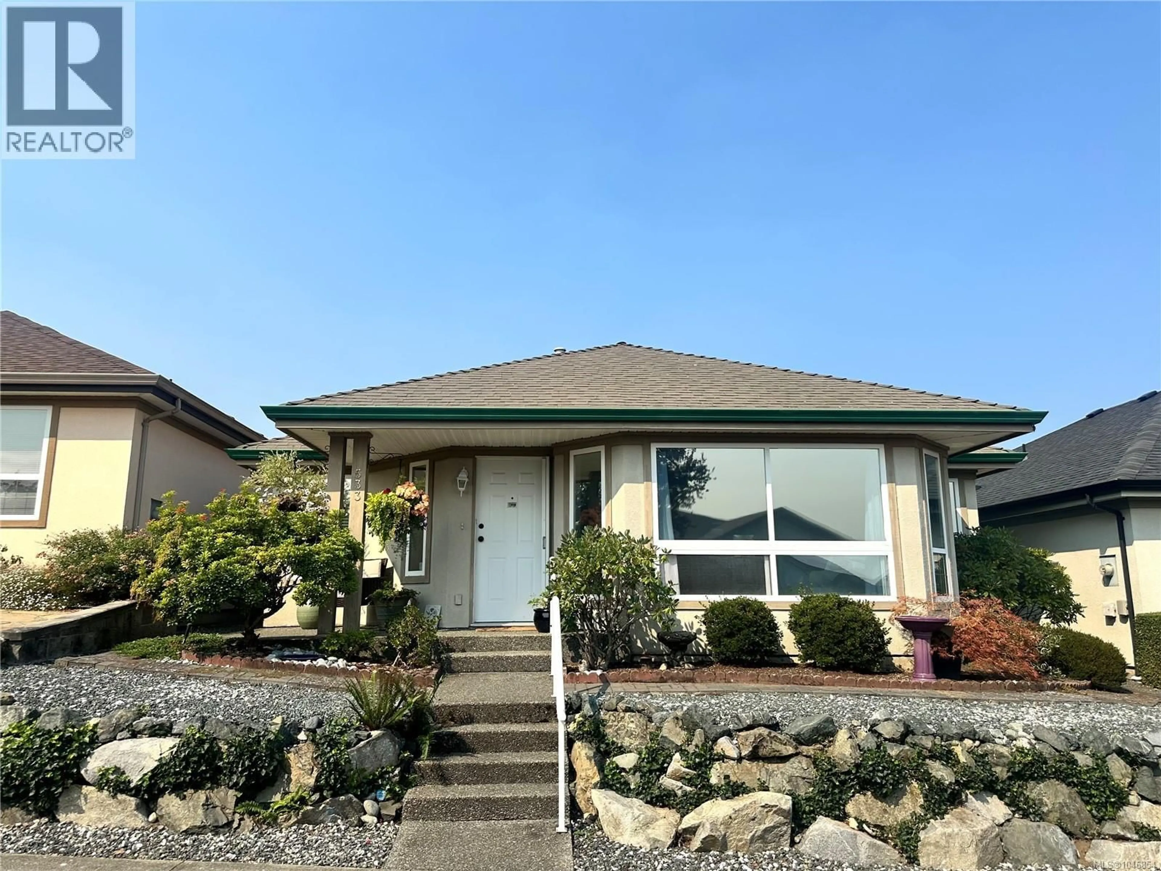 Home with vinyl exterior material, street for 533 HAMPSTEAD STREET, Parksville British Columbia V9P2T7