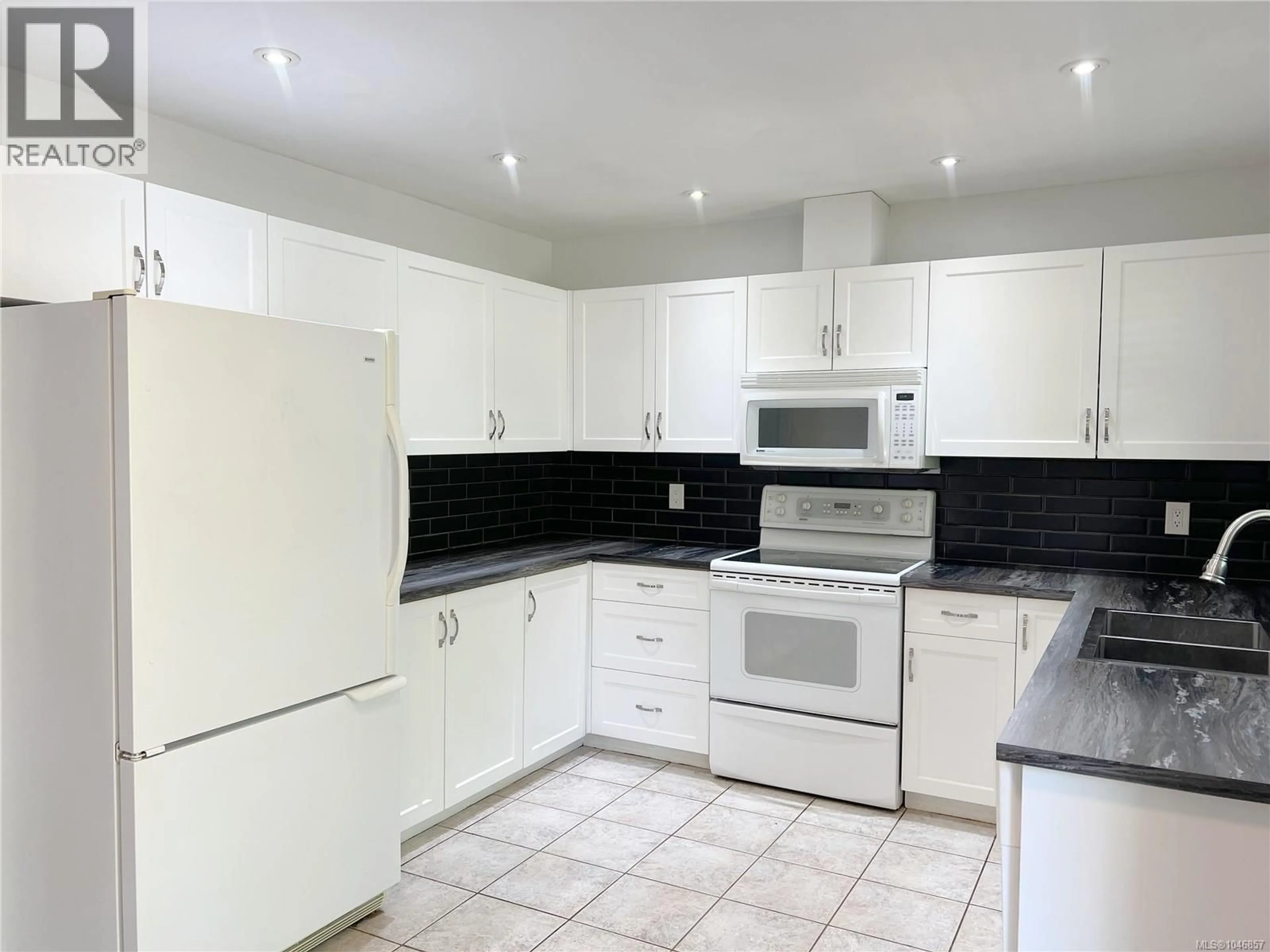 Standard kitchen, ceramic/tile floor for 492 CEDAR CRESCENT, Gold River British Columbia V0P1G0