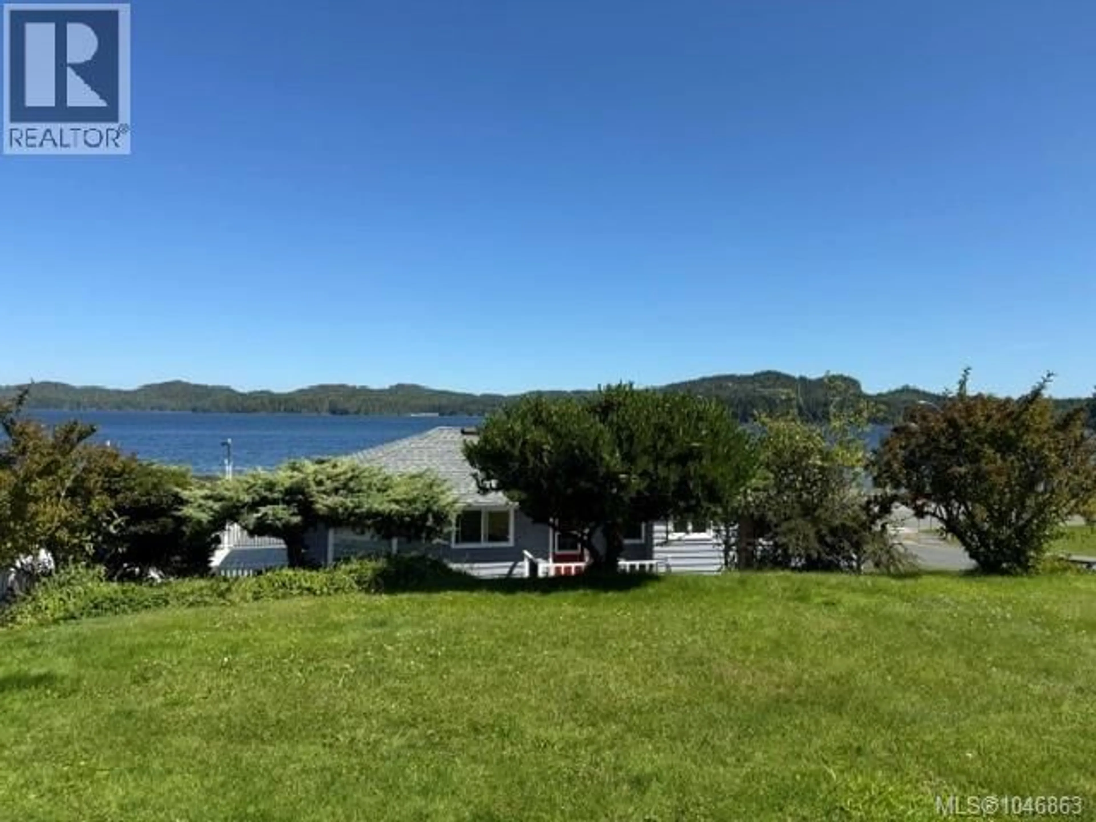 A pic from outside/outdoor area/front of a property/back of a property/a pic from drone, water/lake/river/ocean view for 7540 MARKET STREET, Port Hardy British Columbia V0N2P0