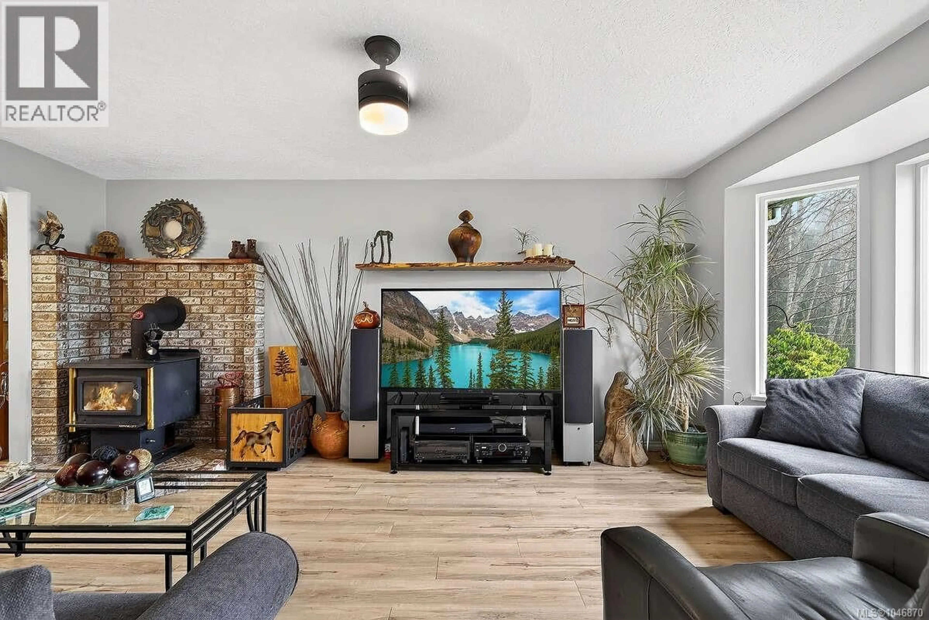 Living room with furniture, unknown for 1136 CORCAN ROAD, Qualicum Beach British Columbia V9K2R6