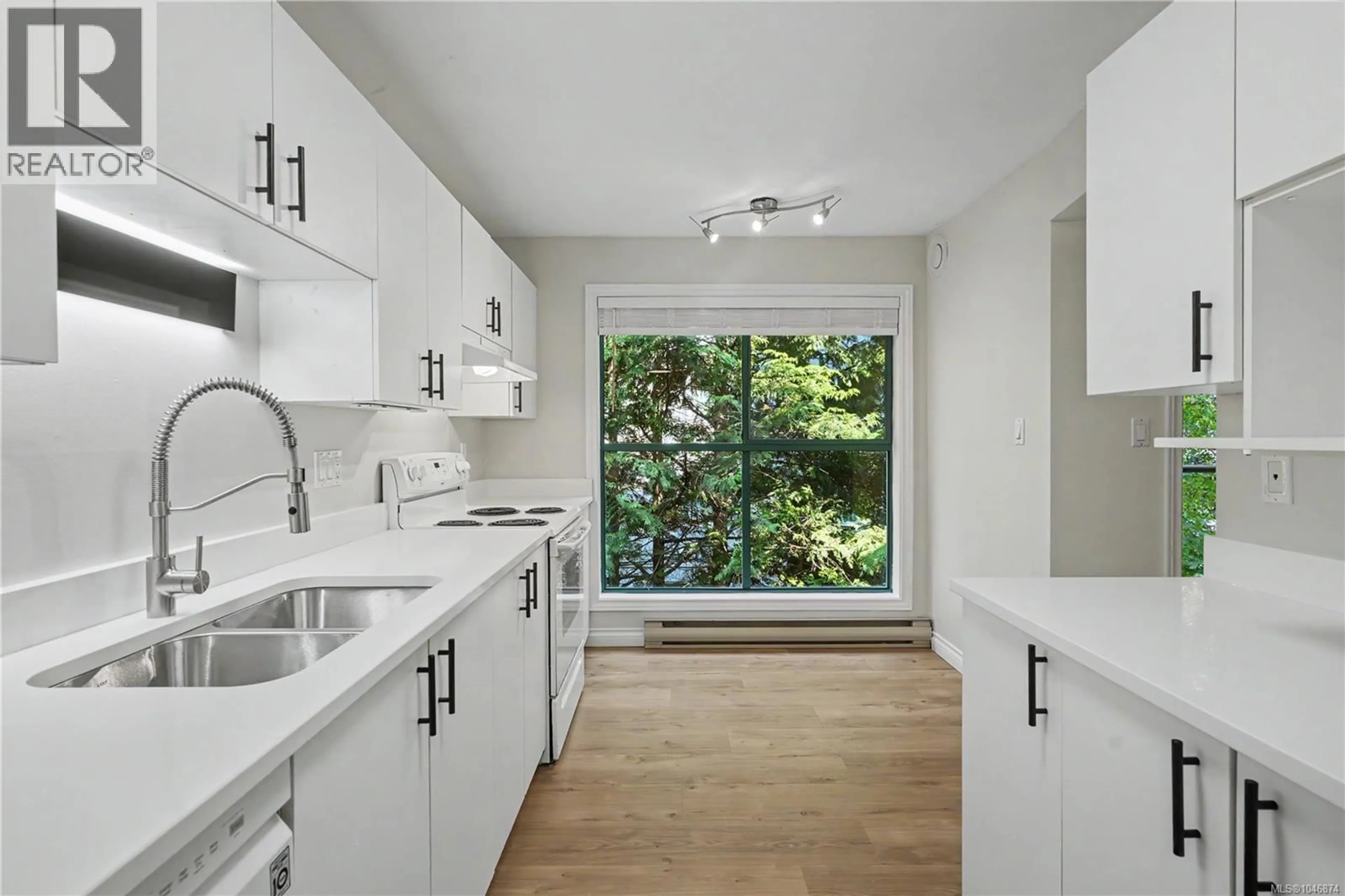 Open concept kitchen, ceramic/tile floor for 303 - 1190 VIEW STREET, Victoria British Columbia V8V5J2