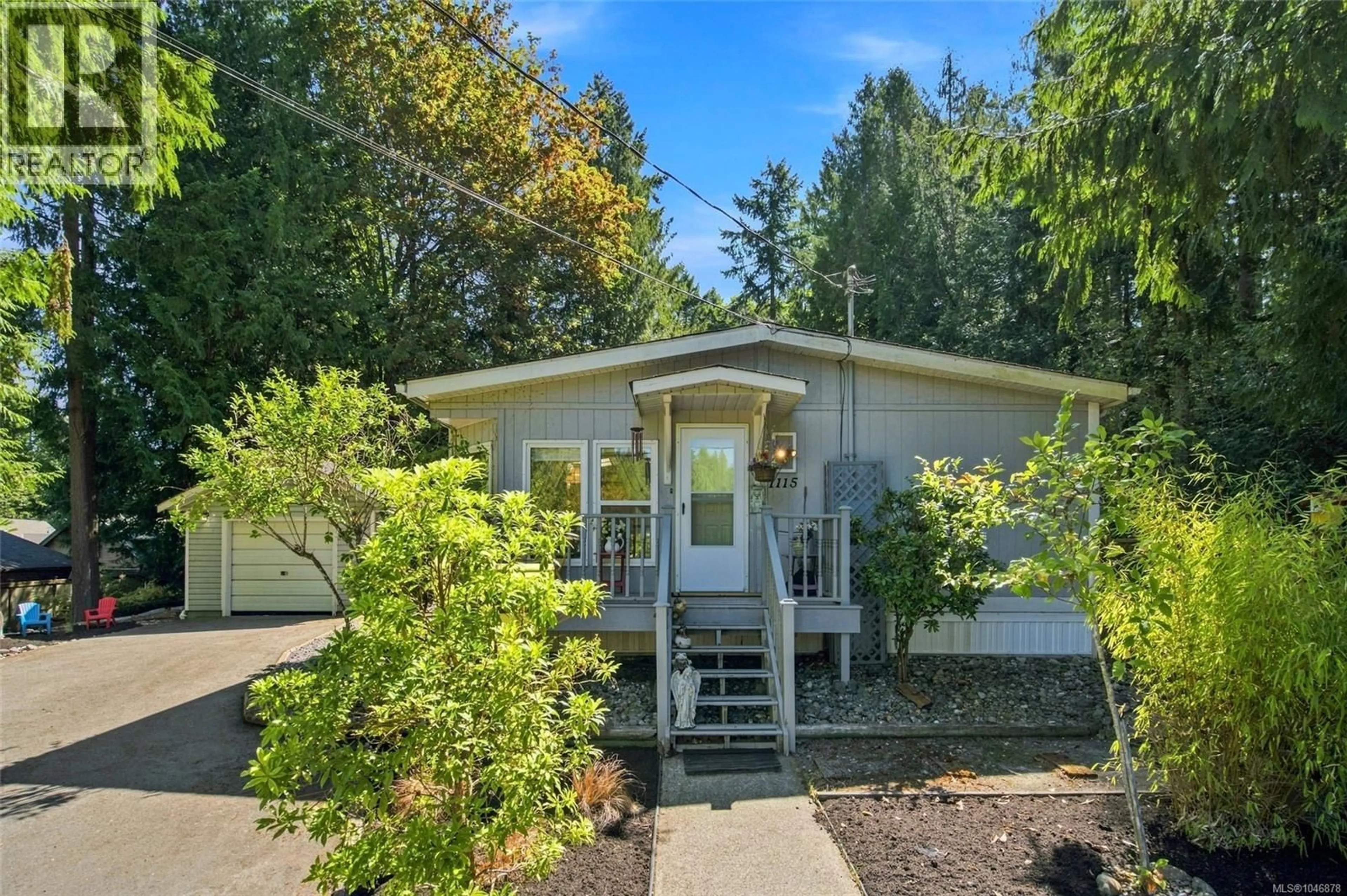 Home with vinyl exterior material, street for 1115 SYMONS CRESCENT, Qualicum Beach British Columbia V9K1M8