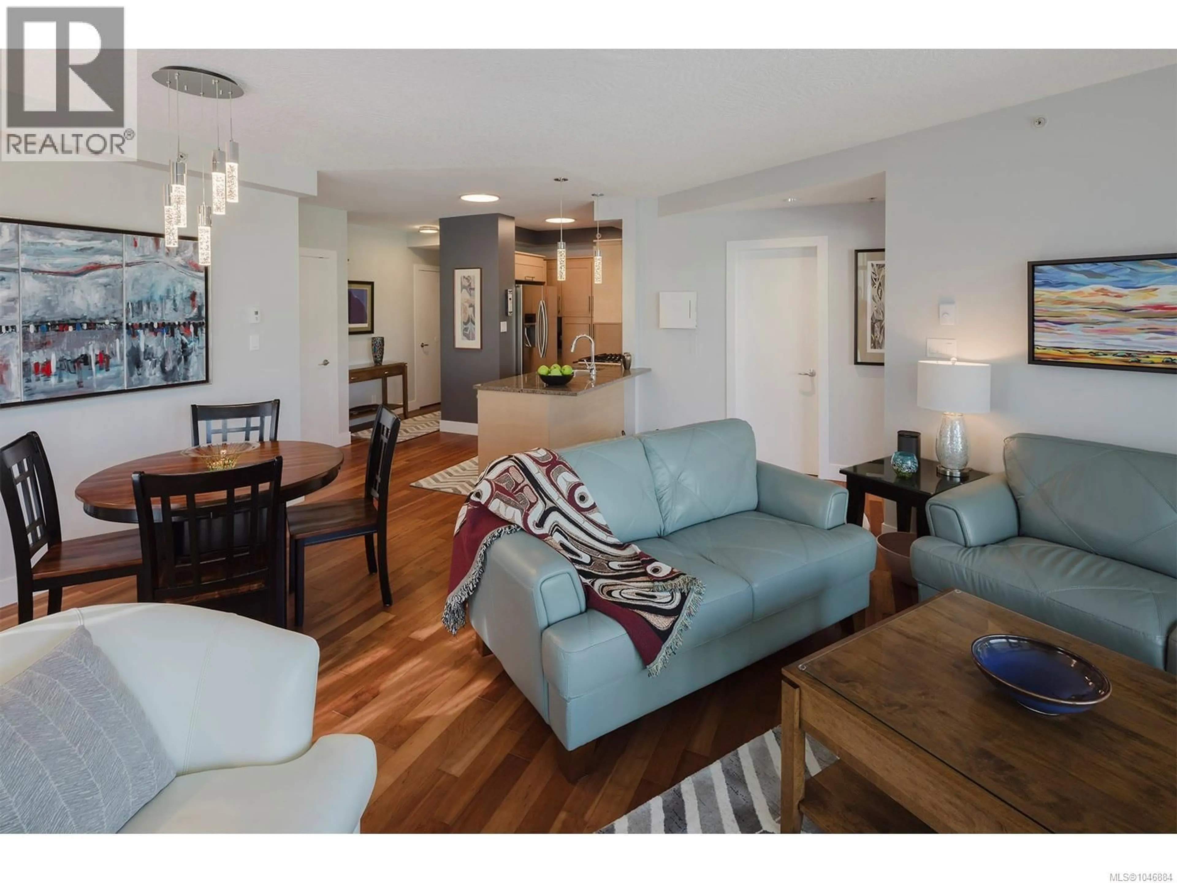 Living room with furniture, wood/laminate floor for N302 - 737 HUMBOLDT STREET, Victoria British Columbia V8W1B1