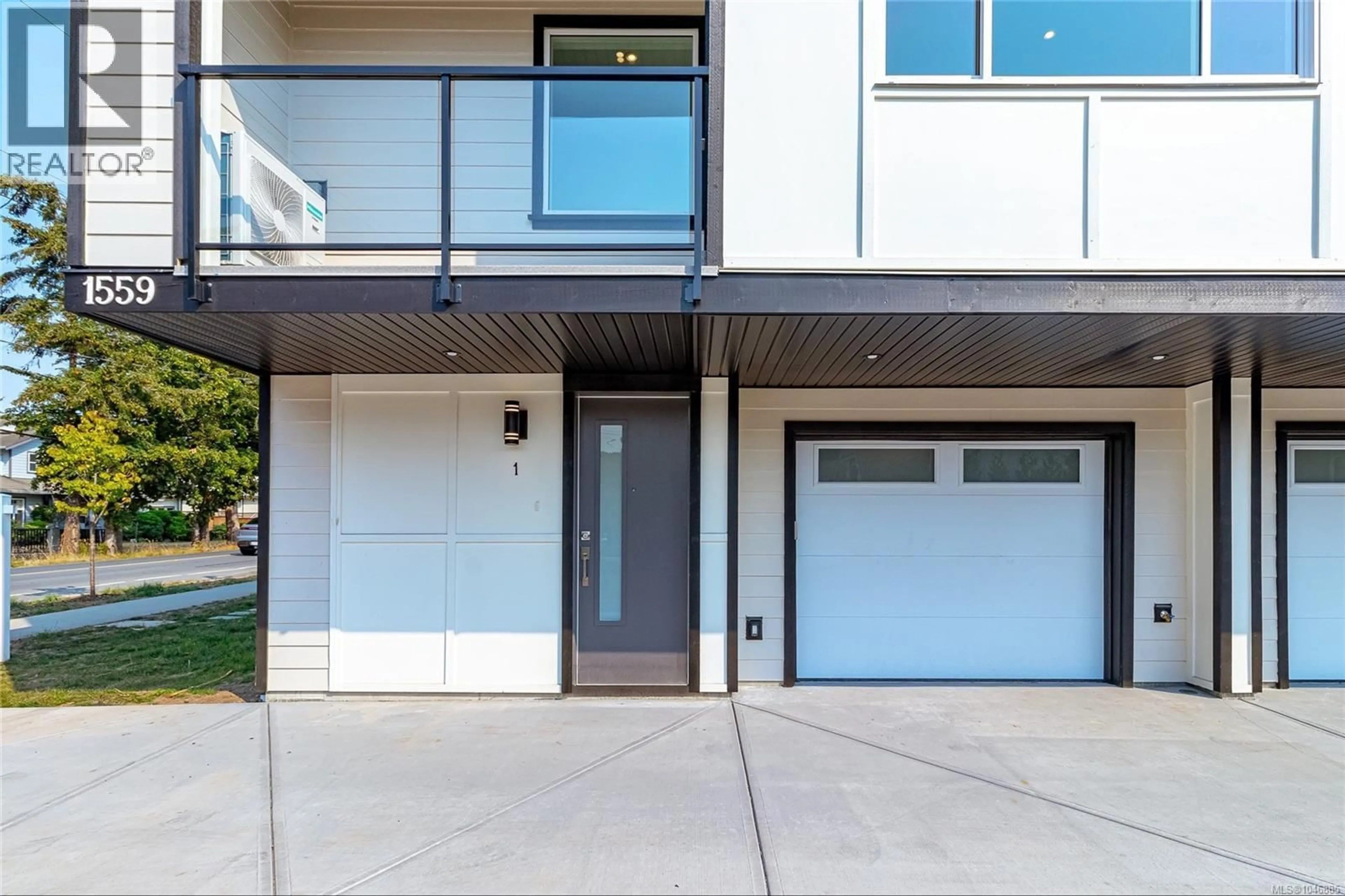 Home with vinyl exterior material, street for 1 - 1559 ASH ROAD, Saanich British Columbia V8N2S9