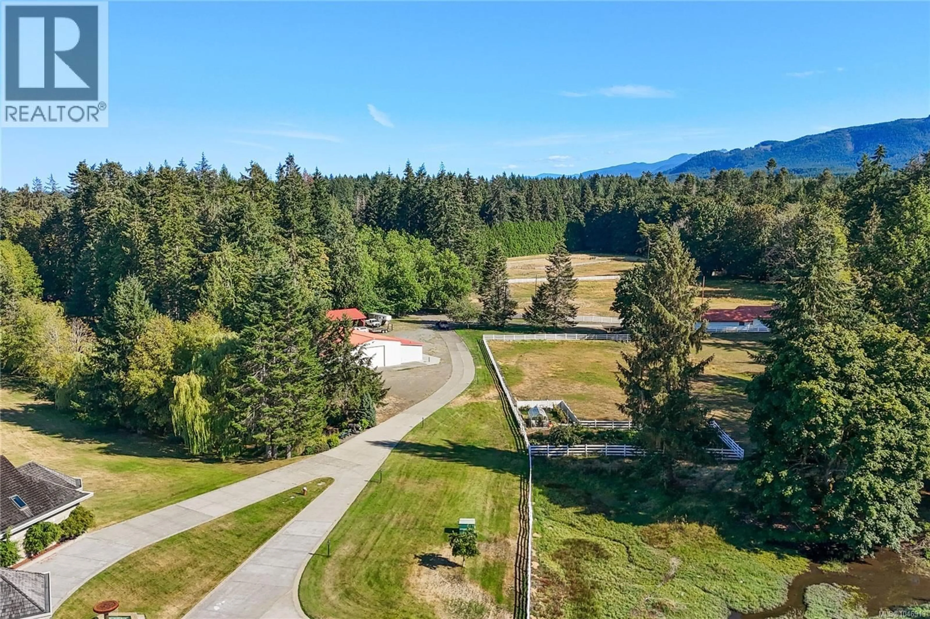 A pic from outside/outdoor area/front of a property/back of a property/a pic from drone, mountain view for 340 BERRAY ROAD, Fanny Bay British Columbia V0R1W0