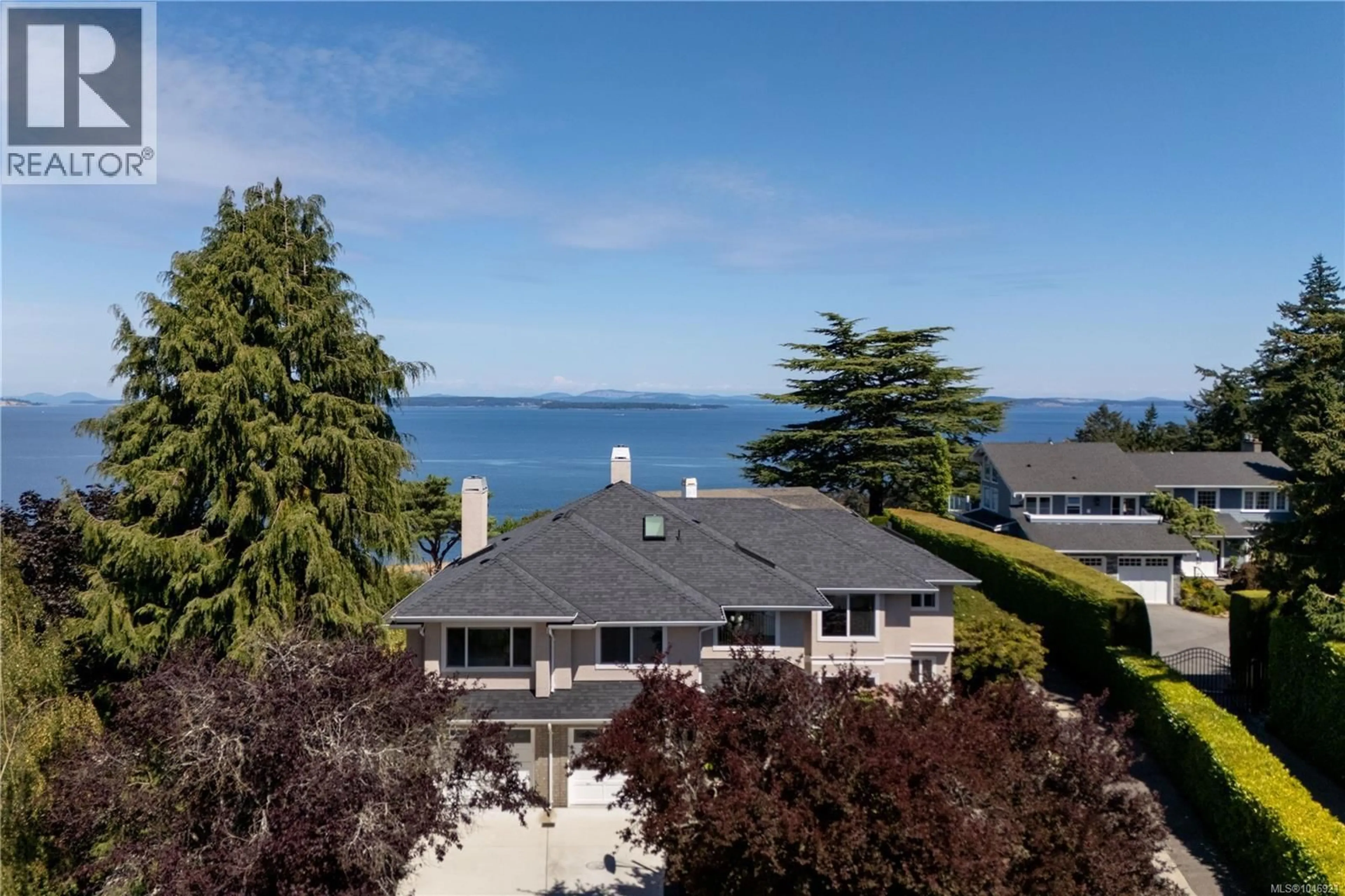 A pic from outside/outdoor area/front of a property/back of a property/a pic from drone, water/lake/river/ocean view for 4596 BONNIEVIEW PLACE, Saanich British Columbia V8N3V6