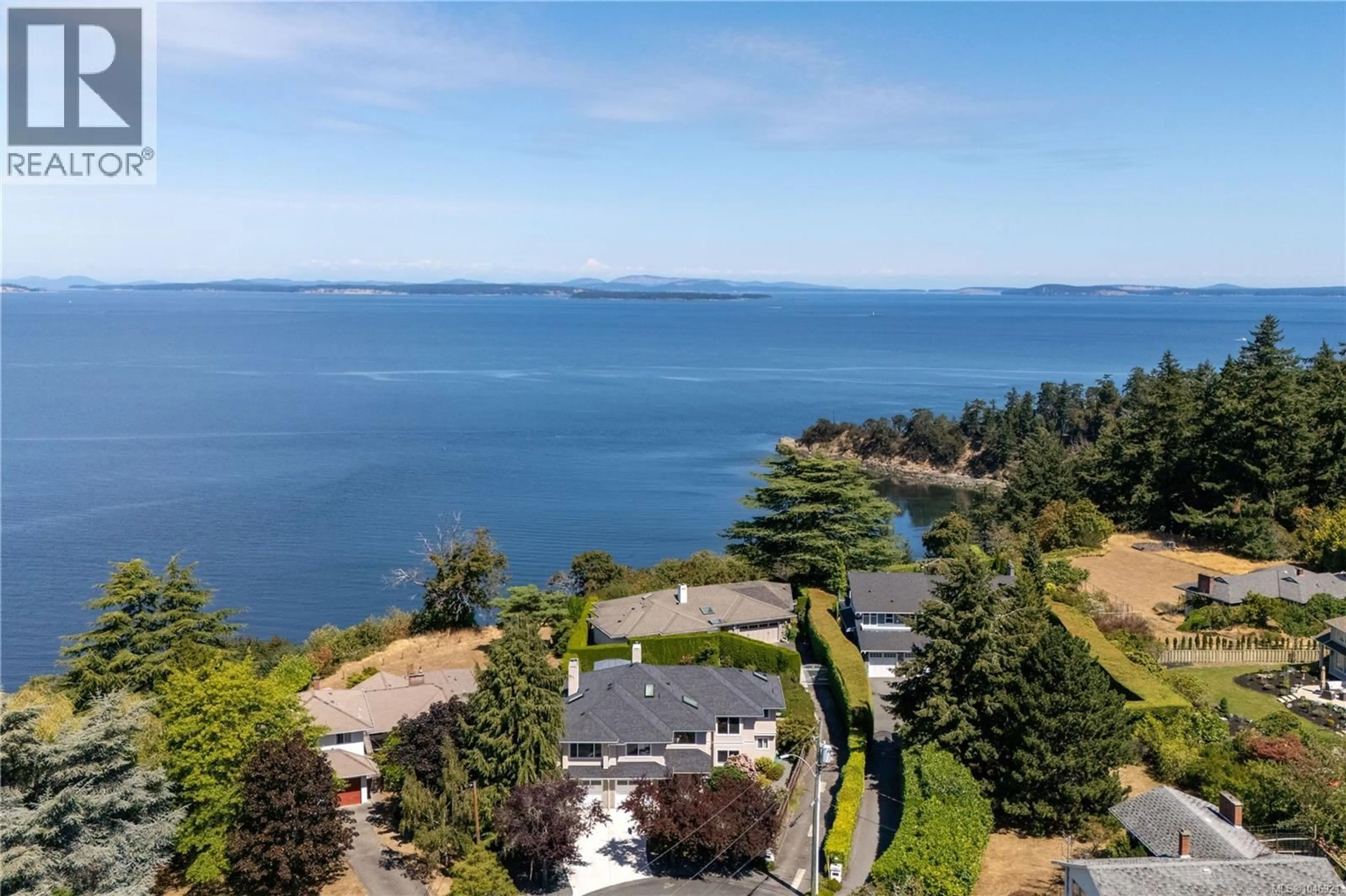 A pic from outside/outdoor area/front of a property/back of a property/a pic from drone, water/lake/river/ocean view for 4596 BONNIEVIEW PLACE, Saanich British Columbia V8N3V6