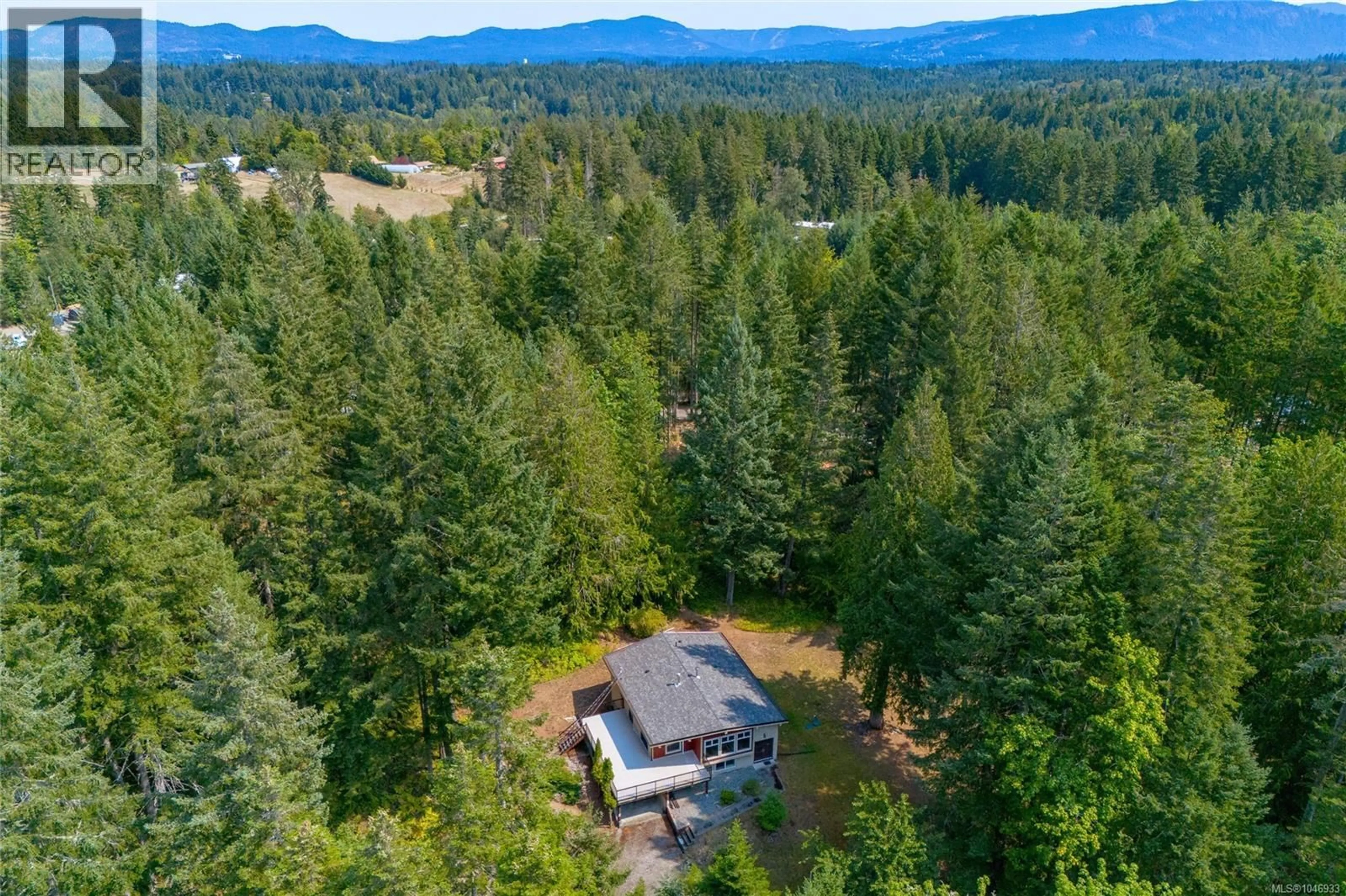 A pic from outside/outdoor area/front of a property/back of a property/a pic from drone, forest/trees view for 5385 WINCHESTER ROAD, Duncan British Columbia V9L6G1