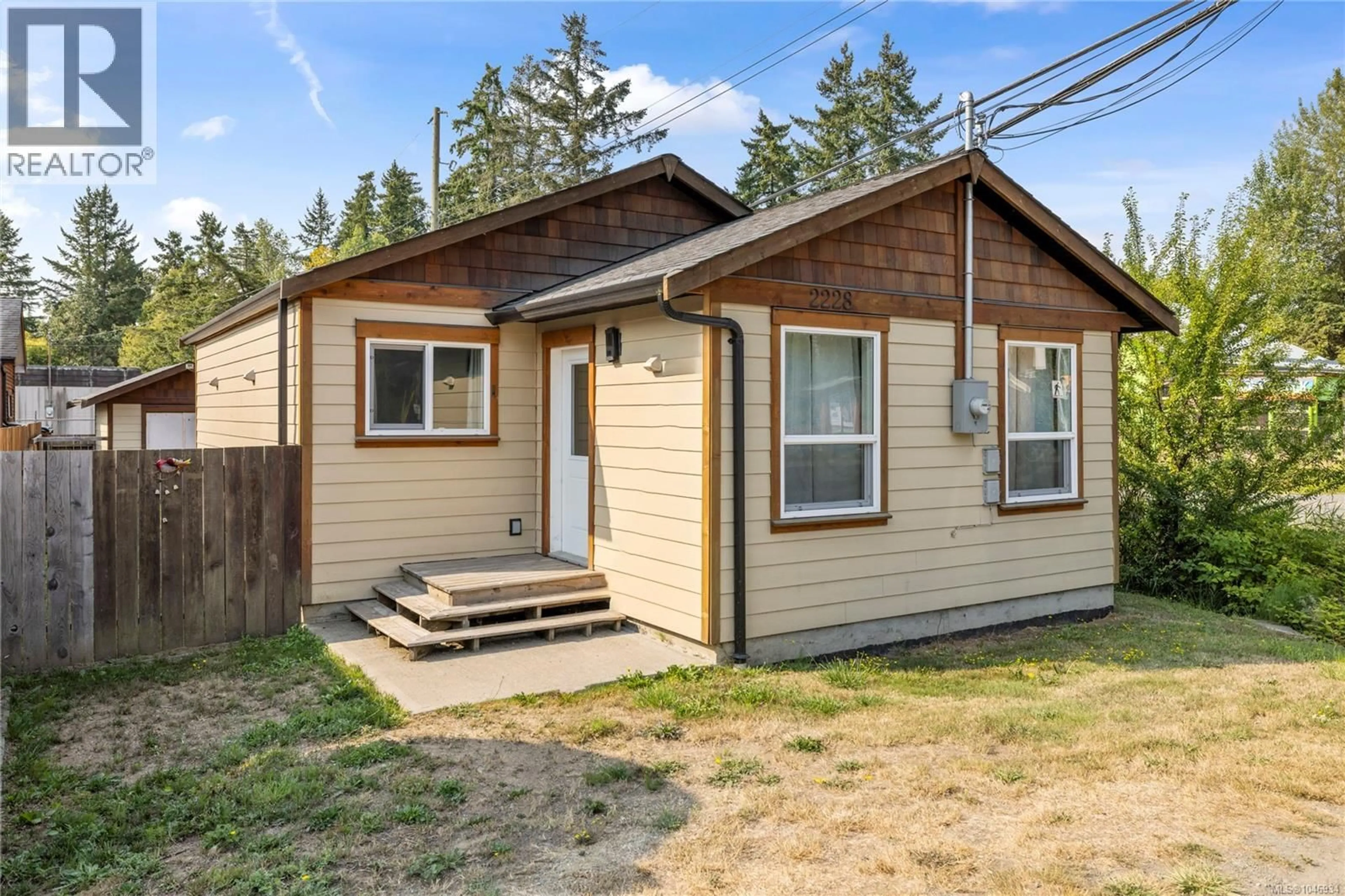 Home with vinyl exterior material, street for 2228 ALBERNI HIGHWAY, Coombs British Columbia V0R1M0