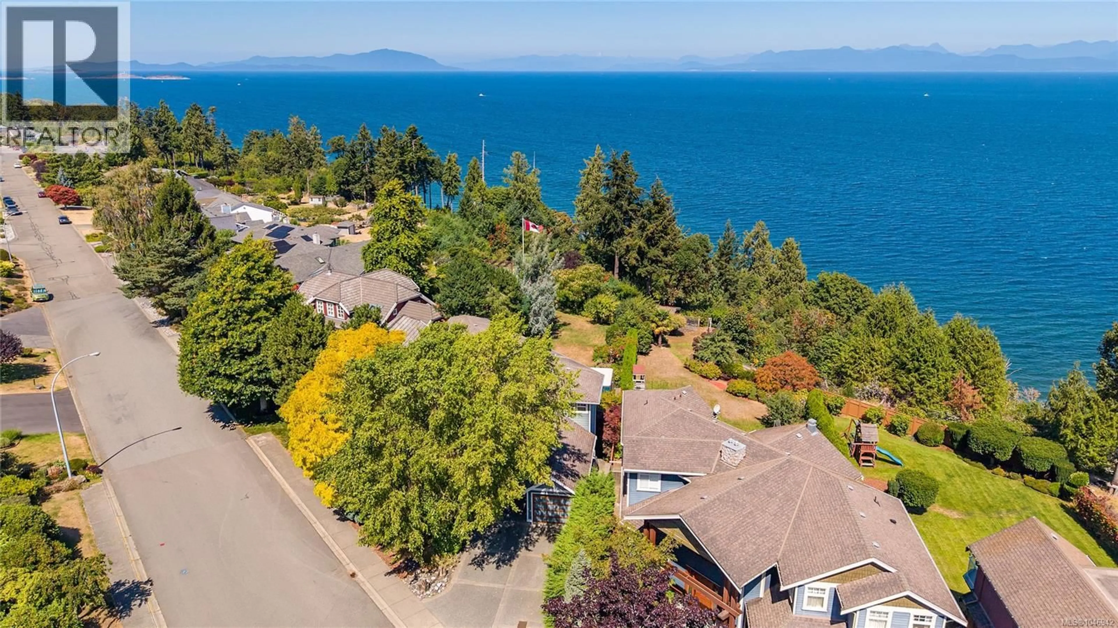 A pic from outside/outdoor area/front of a property/back of a property/a pic from drone, water/lake/river/ocean view for 6002 ICARUS DRIVE, Nanaimo British Columbia V9V1C8