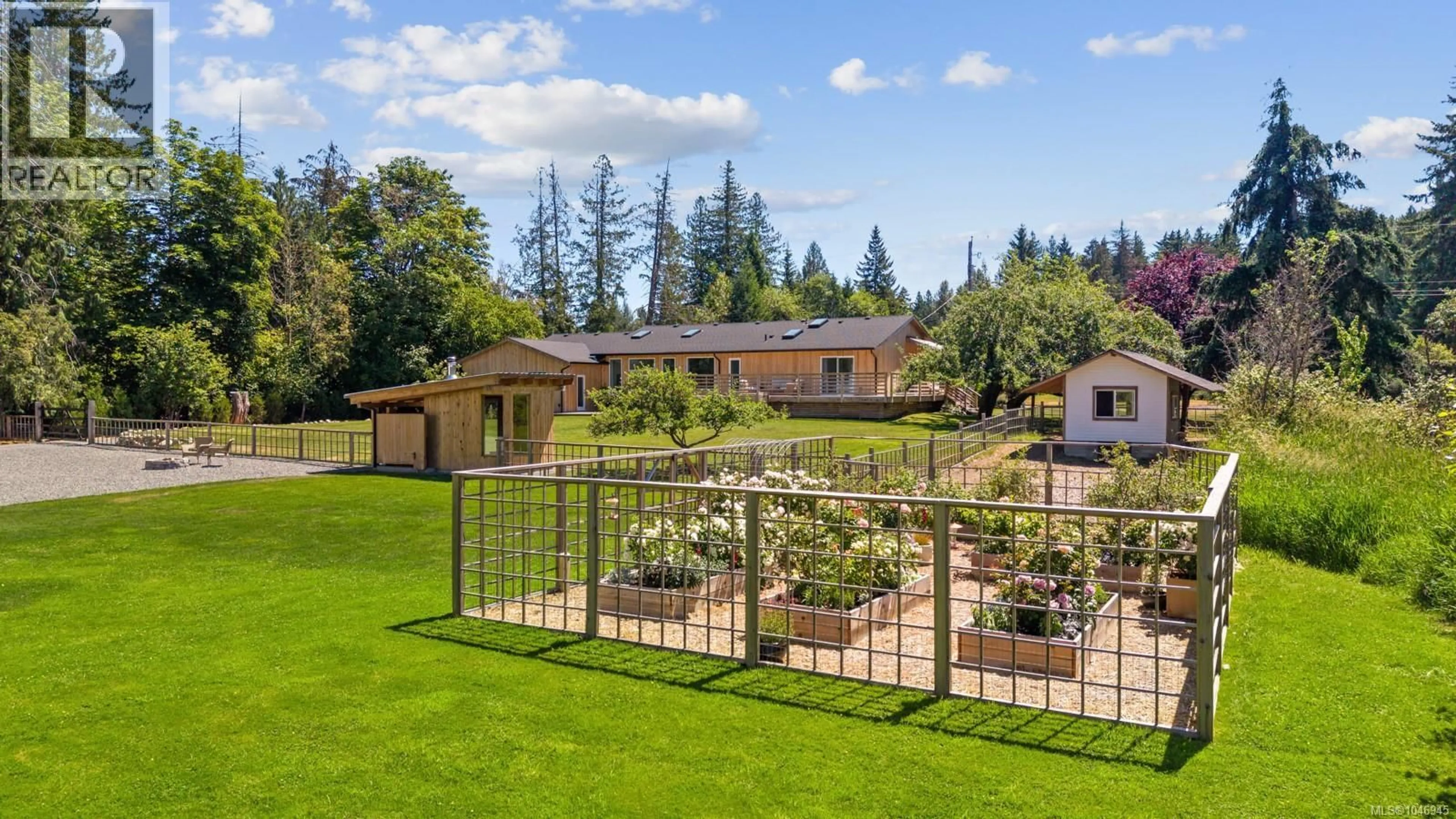 A pic from outside/outdoor area/front of a property/back of a property/a pic from drone, mountain view for 2925 BAIRD ROAD, Courtenay British Columbia V9N9N6