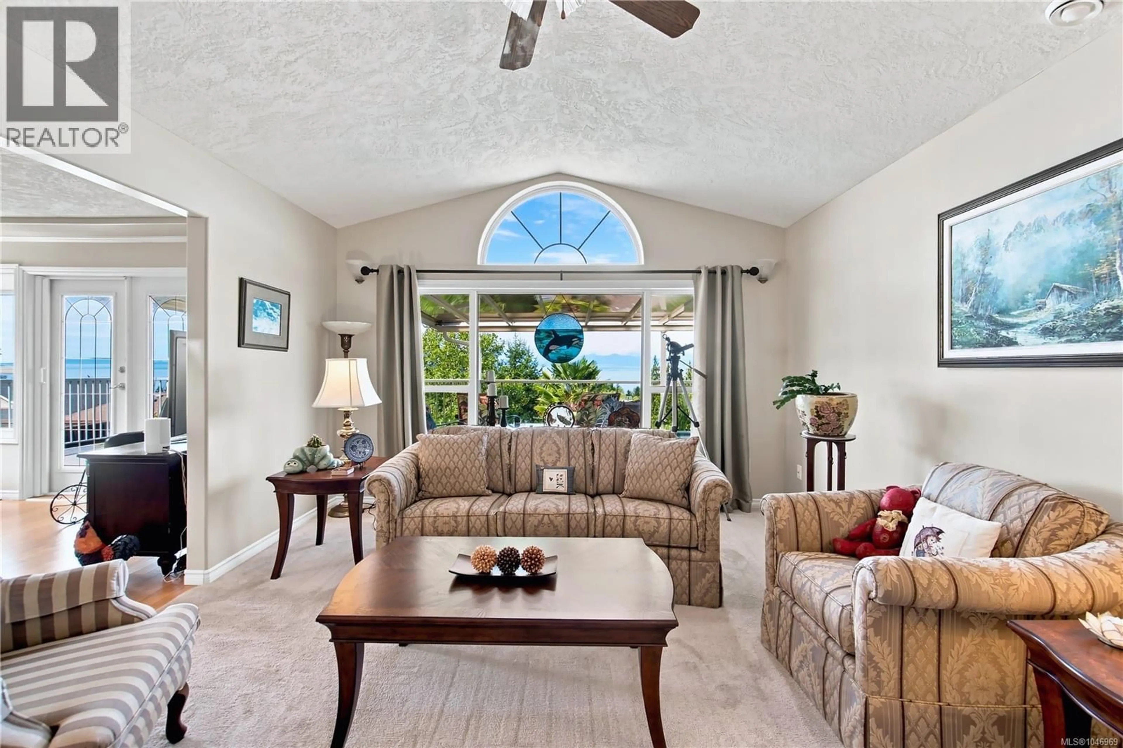 Living room with furniture, ceramic/tile floor for 5200 LAGUNA WAY, Nanaimo British Columbia V9T5L7