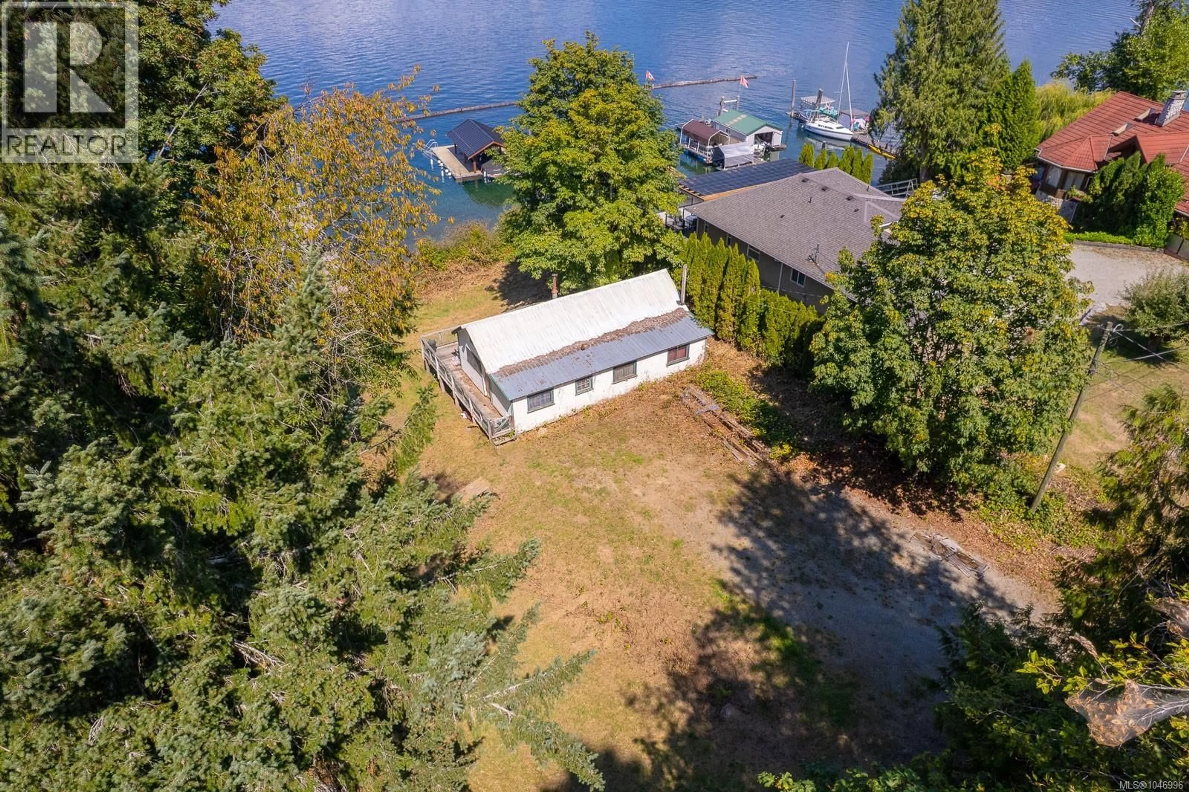 A pic from outside/outdoor area/front of a property/back of a property/a pic from drone, water/lake/river/ocean view for 9087 FABER ROAD, Port Alberni British Columbia V9Y9C1