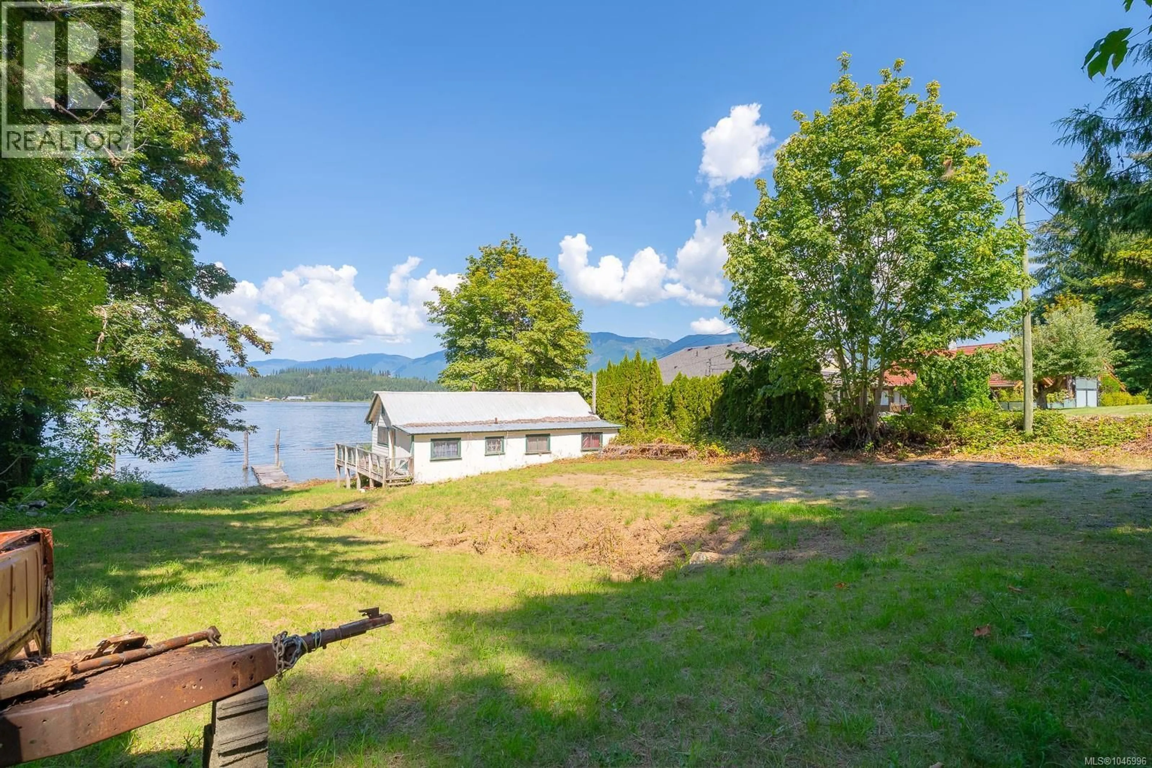 A pic from outside/outdoor area/front of a property/back of a property/a pic from drone, water/lake/river/ocean view for 9087 FABER ROAD, Port Alberni British Columbia V9Y9C1