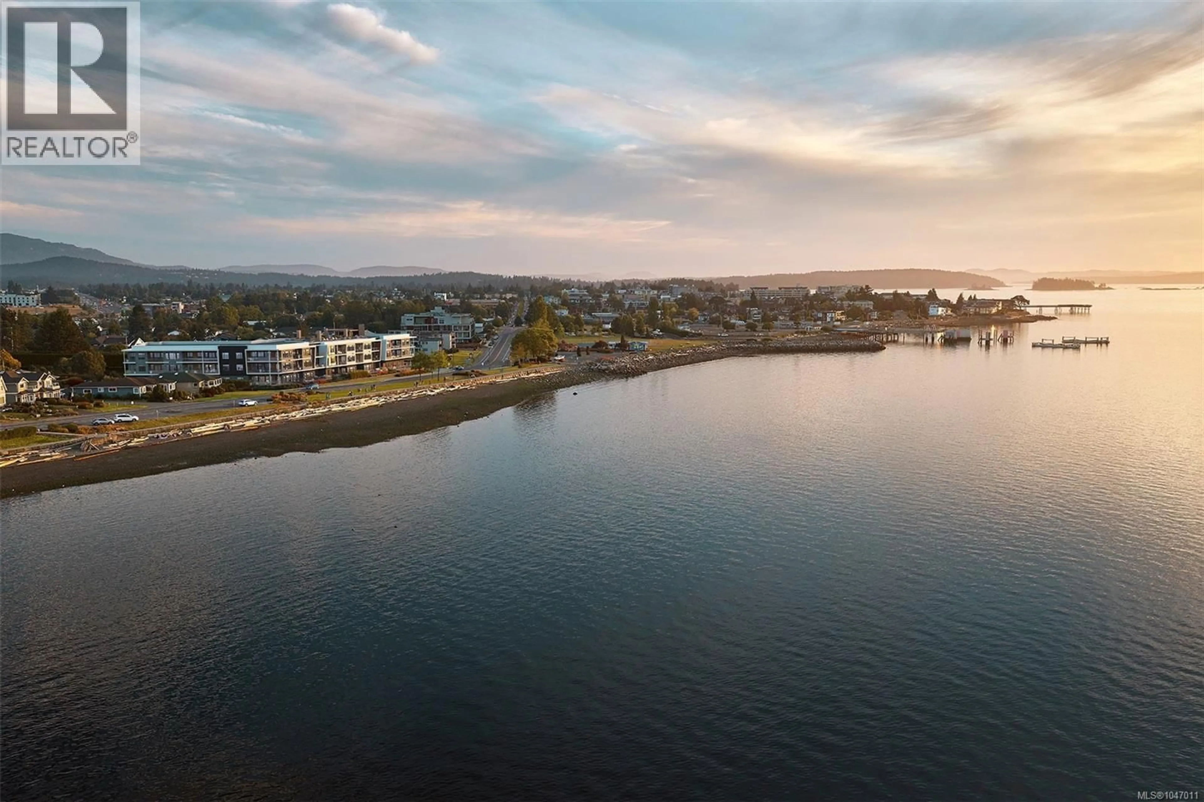 A pic from outside/outdoor area/front of a property/back of a property/a pic from drone, water/lake/river/ocean view for 306 - 9522 LOCHSIDE DRIVE, Sidney British Columbia V8L1N8
